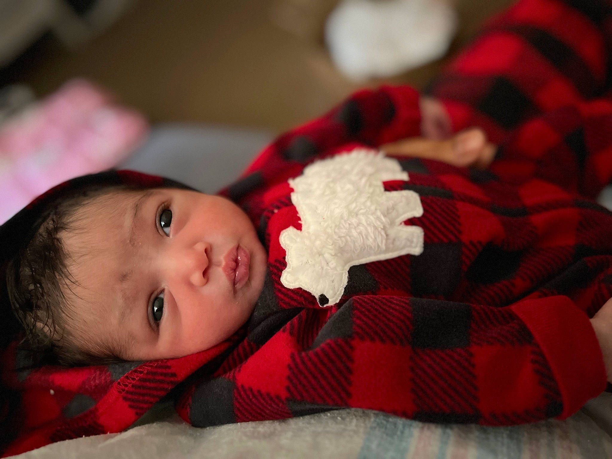 Meliani is registered to the contest to win money with this photo: baby, baby_toddler_clothing, carmine, child, christmas, comfort, fashion_accessory, flash_photography, fur, lip, pattern, person, plaid, portrait_photography, red, skin, tartan, toddler, tree, wood