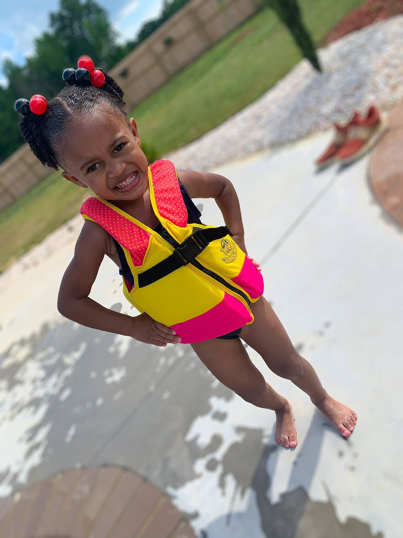 Lauryn is registered to the contest to win money with this photo: child, fun, joy, leisure, lifejacket, person, personal_protective_equipment, play, recreation, summer, vacation