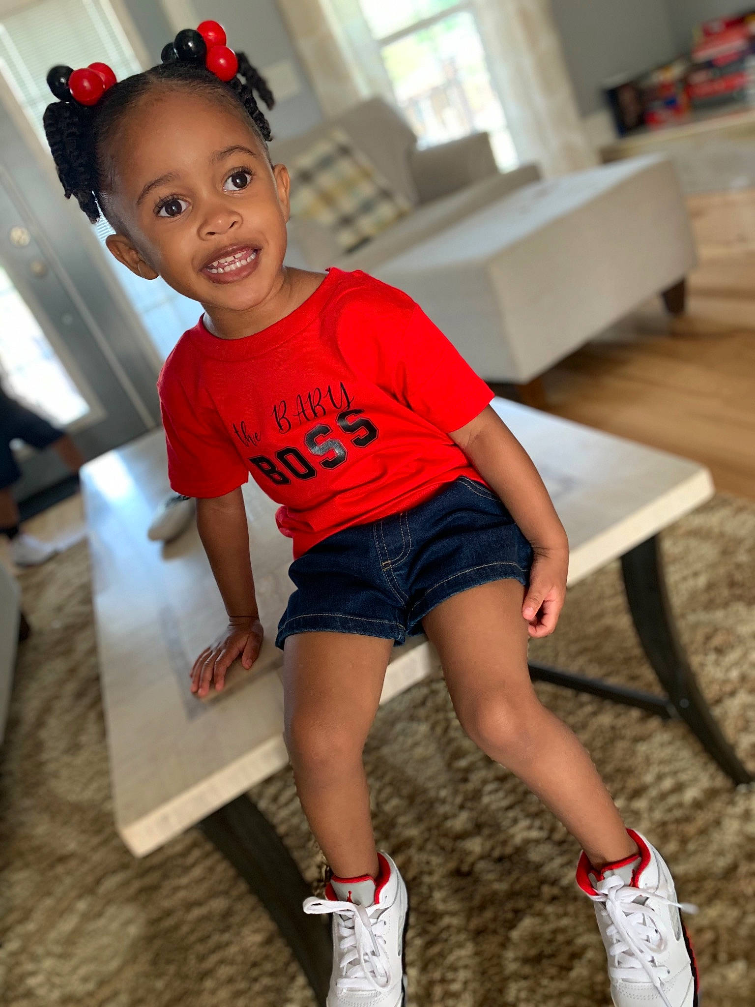 Lauryn is registered to the contest to win money with this photo: child, child_model, footwear, human_leg, joint, joy, knee, leg, person, play, shoe, shorts, smile, t_shirt, thigh, toddler
