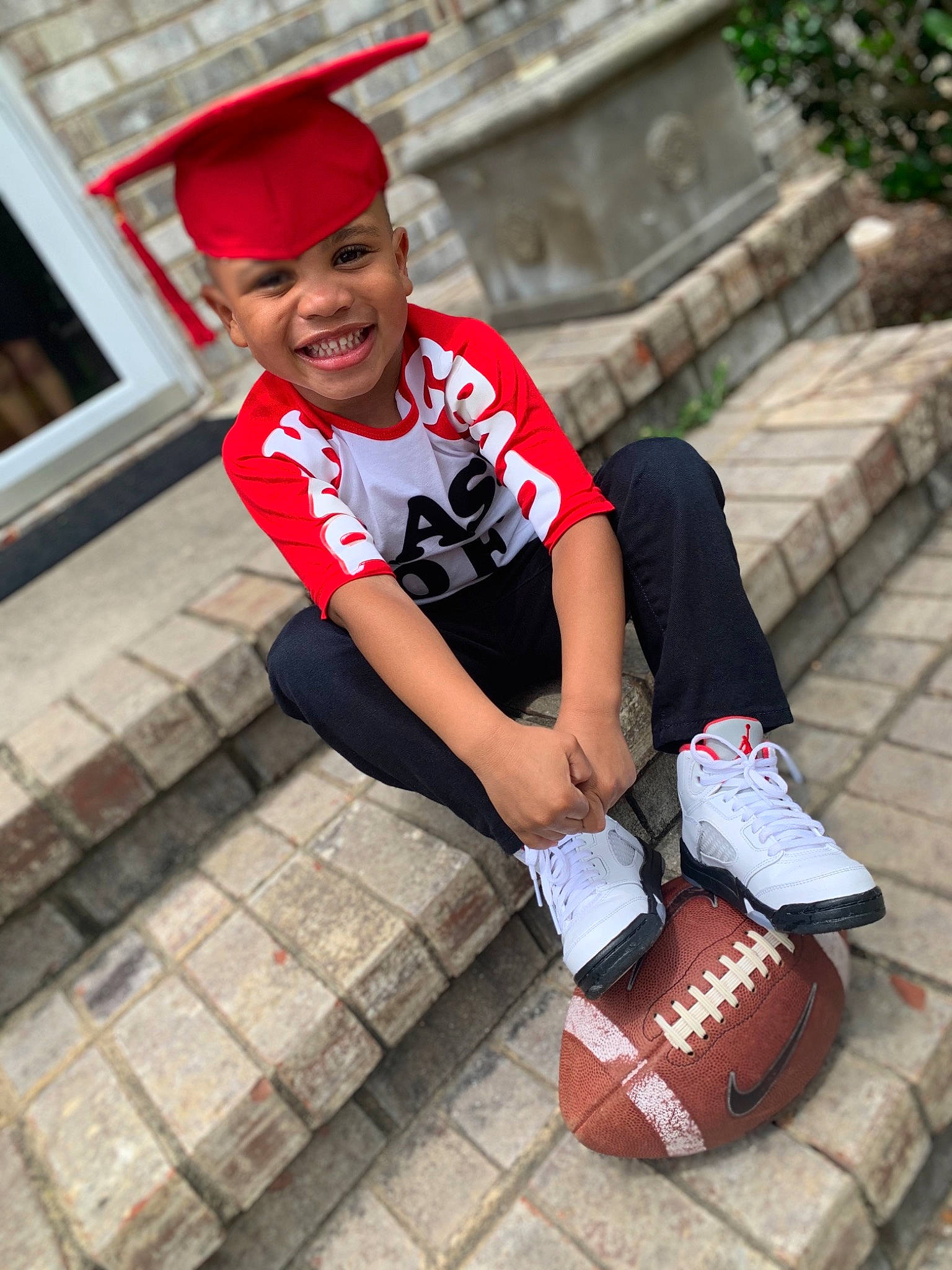 Landon is registered to the contest to win money with this photo: cap, child, costume, fashion_accessory, footwear, headgear, headwear, human_leg, leg, person, photography, shoe, street_fashion, style, t_shirt, thigh