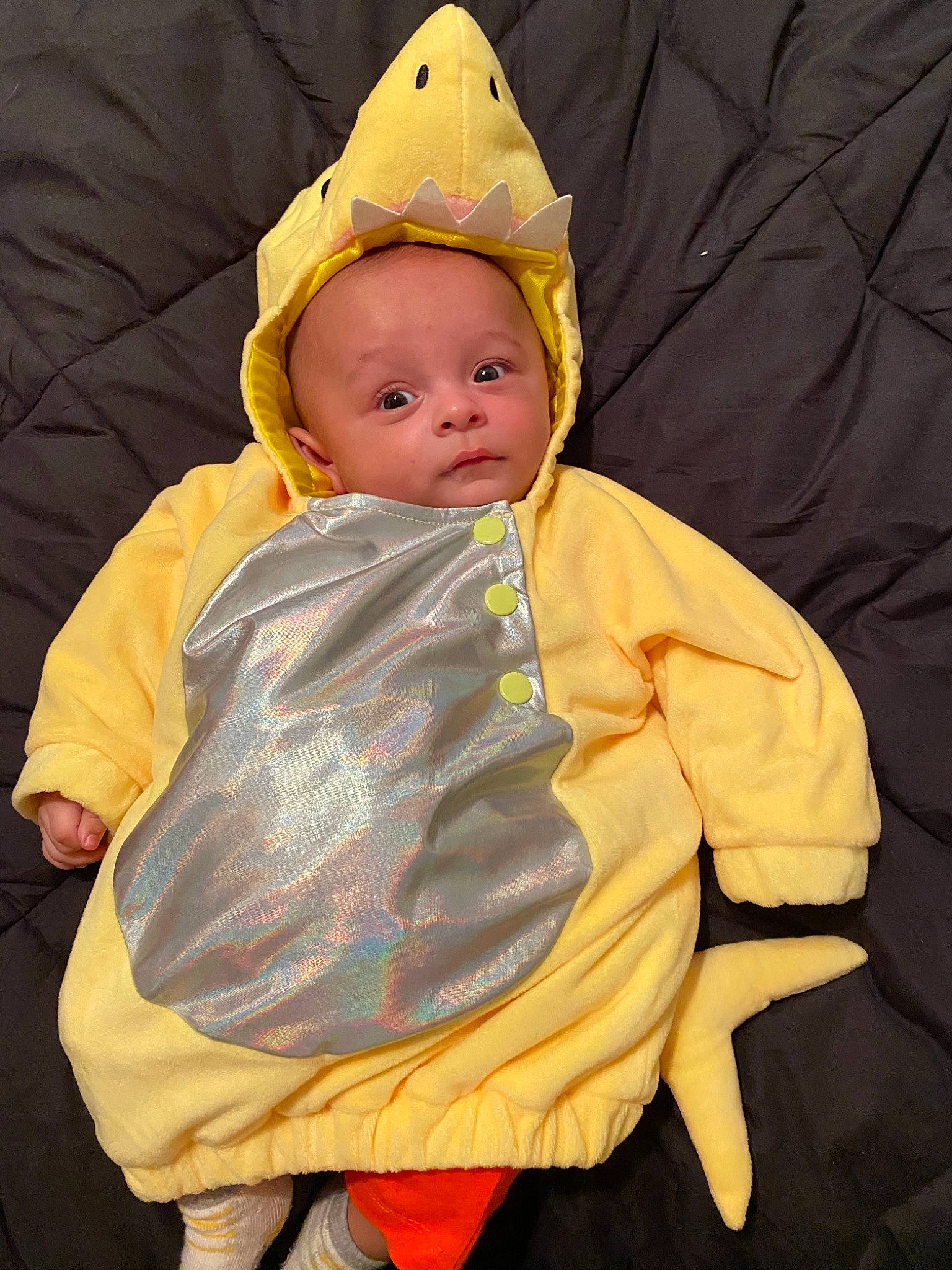 Kaiden is registered to the contest to win money with this photo: baby, child, costume, outerwear, person, toddler, yellow