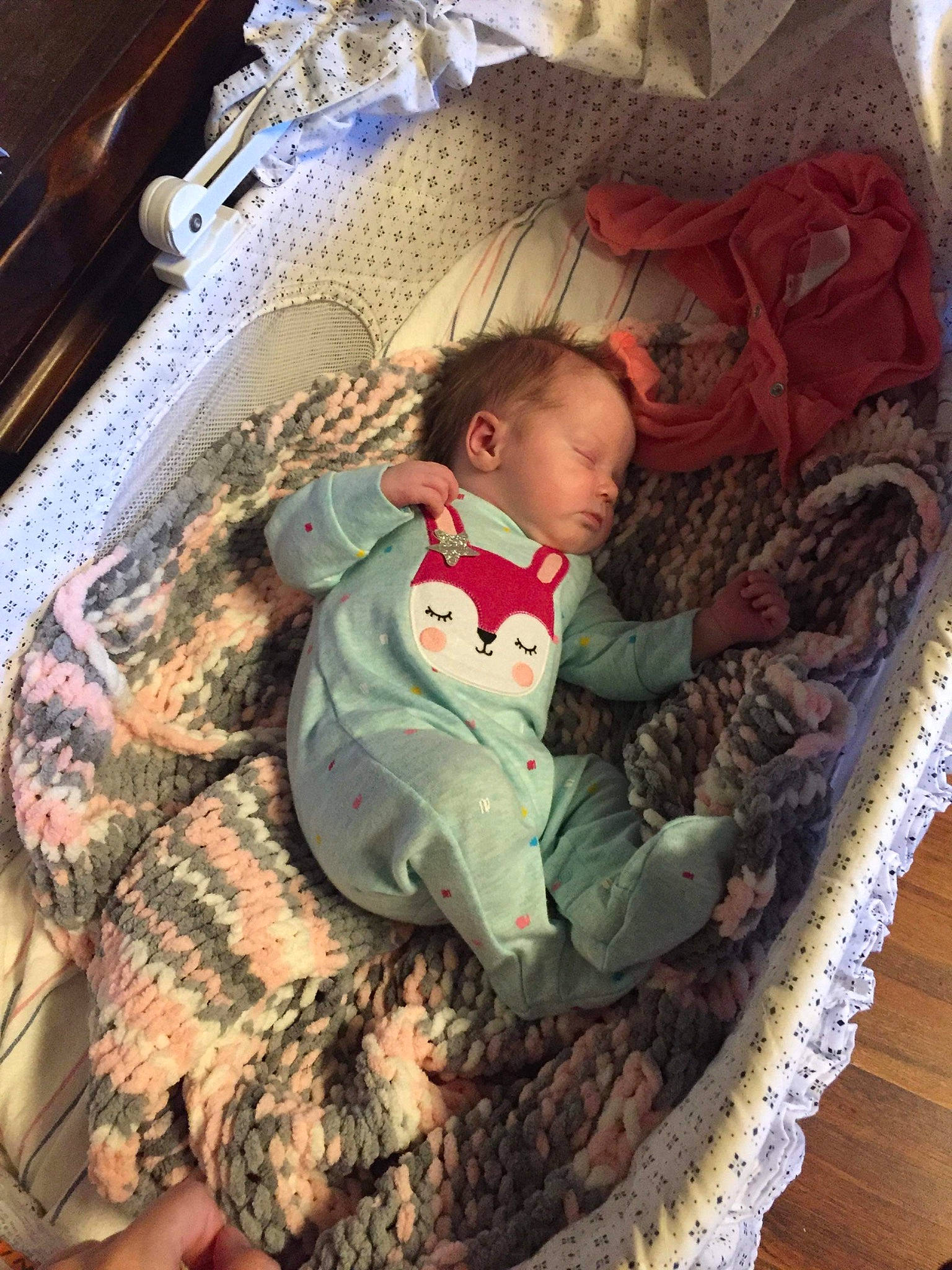 Shannon is registered to the contest to win money with this photo: baby, baby_safety, baby_sleeping, baby_toddler_clothing, beauty, camouflage, cheek, child, comfort, eye, hairstyle, head, infant_bed, linens, military_camouflage, pattern, person, sitting, skin, toddler