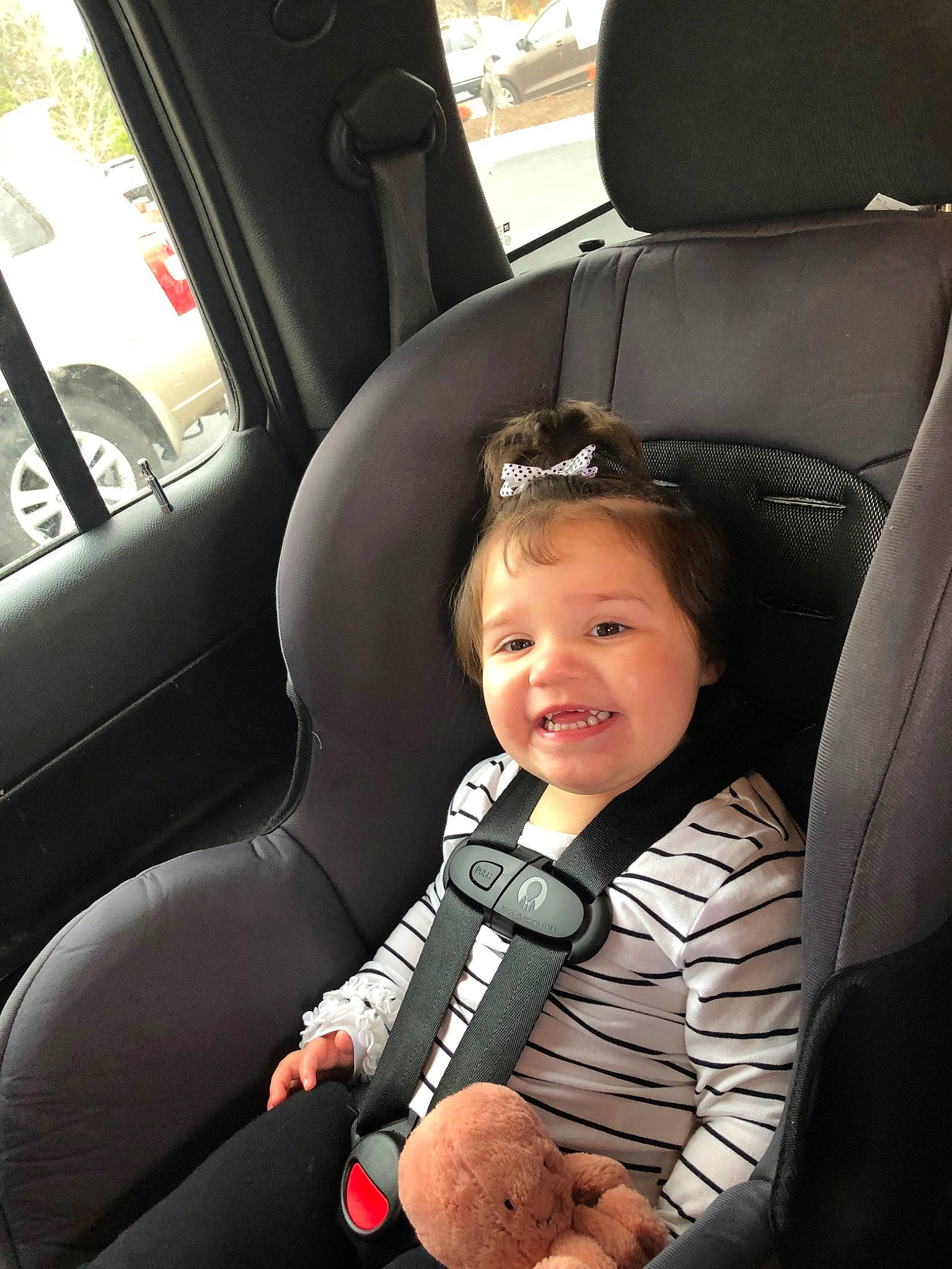 Viola is registered to the contest to win money with this photo: auto_part, baby, baby_in_car_seat, car, car_seat, car_seat_cover, child, comfort, driving, head_restraint, person, plant, seat_belt, toddler, vacation, vehicle