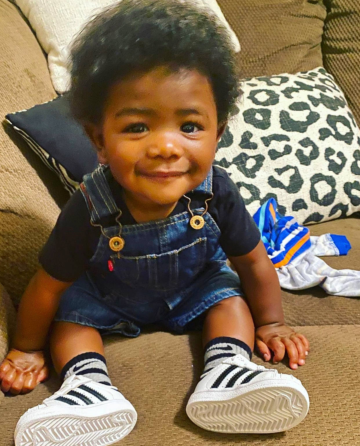 Kailen joined the competition — help win amazing prizes! baby_toddler_clothing, black, cheek, child, comfort, cool, electric_blue, flooring, footwear, fun, happy, joy, person, shoe, sitting, sleeve, smile, sneakers, sock, toddler