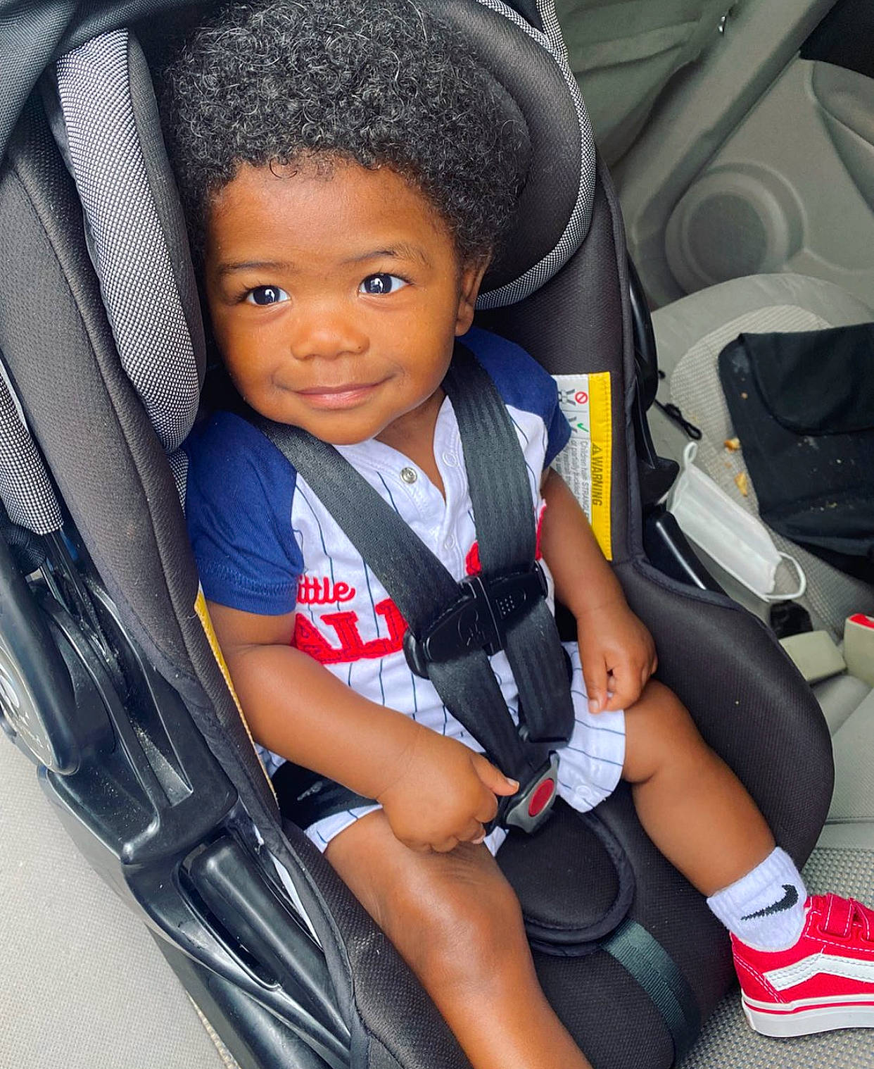 Kailen joined the competition — help win amazing prizes! auto_part, automotive_design, baby_carriage, beauty, black, car_seat, car_seat_cover, child, clothing, comfort, head_restraint, joy, motor_vehicle, person, plant, product, shorts, smile, toddler, vehicle_door