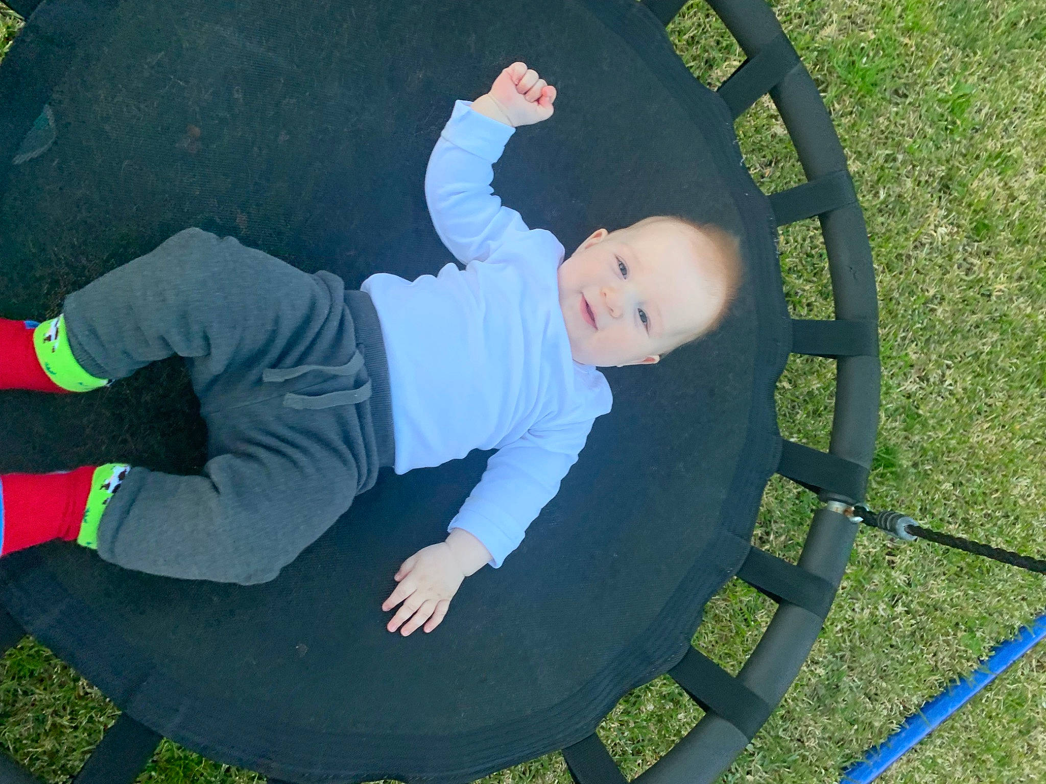 Dean is registered to the contest to win money with this photo: baby, chair, child, circle, flash_photography, flooring, fun, grass, happy, human_body, lawn, leaf, leg, leisure, people_in_nature, person, plant, play, t_shirt, toddler