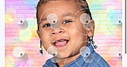Shaun is registered to the contest to win money with this photo: blue_shirt, braided_hair, brick_wall, child, colorful_background, cute, earrings, fashion, happy, head_and_shoulders, indoors, joyful, pastel_colors, person, portrait, posing, smiling, studio_photo, toddler, young