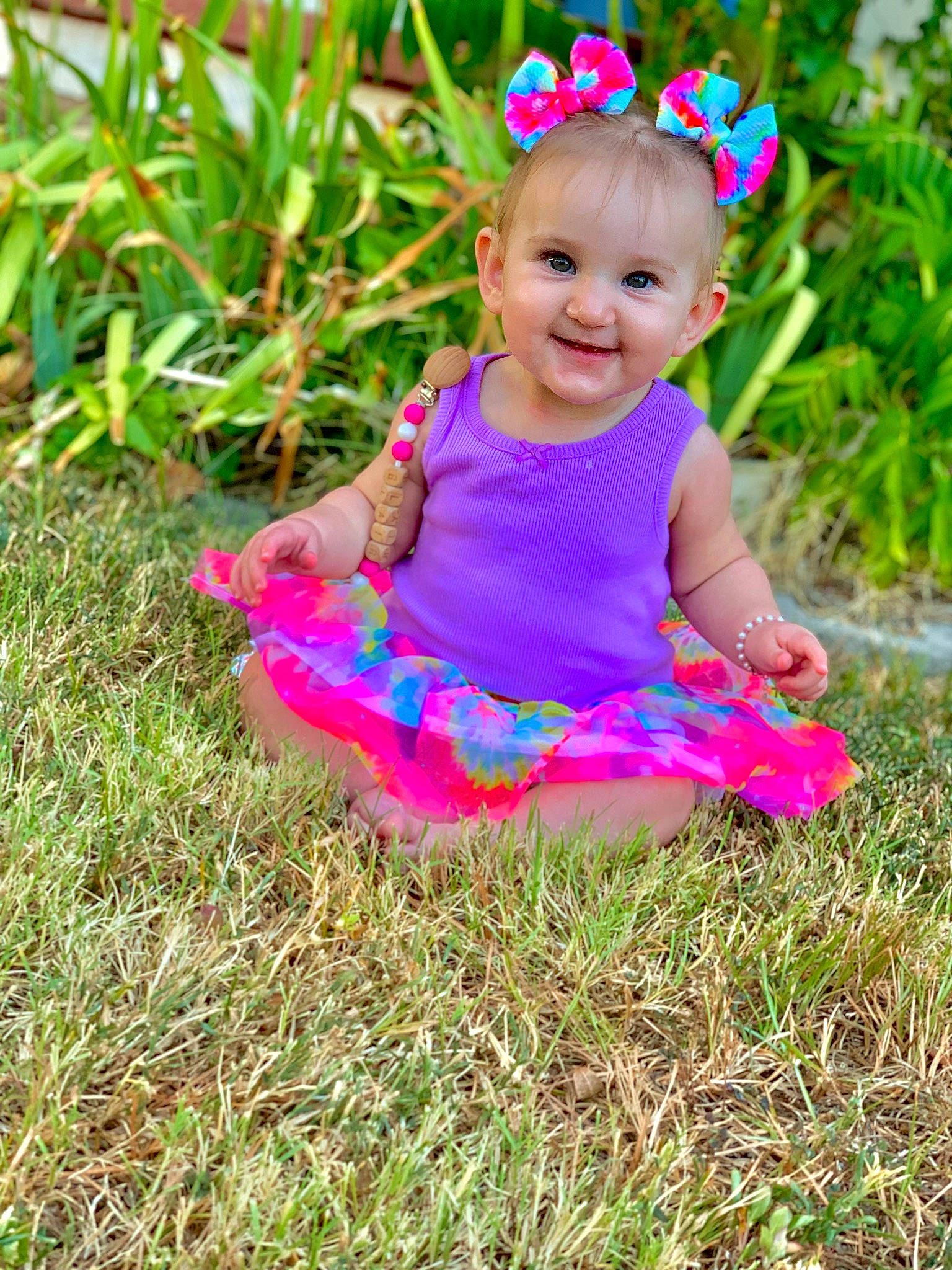 Blair joined the competition — help win amazing prizes! baby, baby_toddler_clothing, child, clothing, electric_blue, eye, fun, grass, grass_family, grassland, happy, headband, joy, magenta, meadow, pattern, people_in_nature, person, pink, plant
