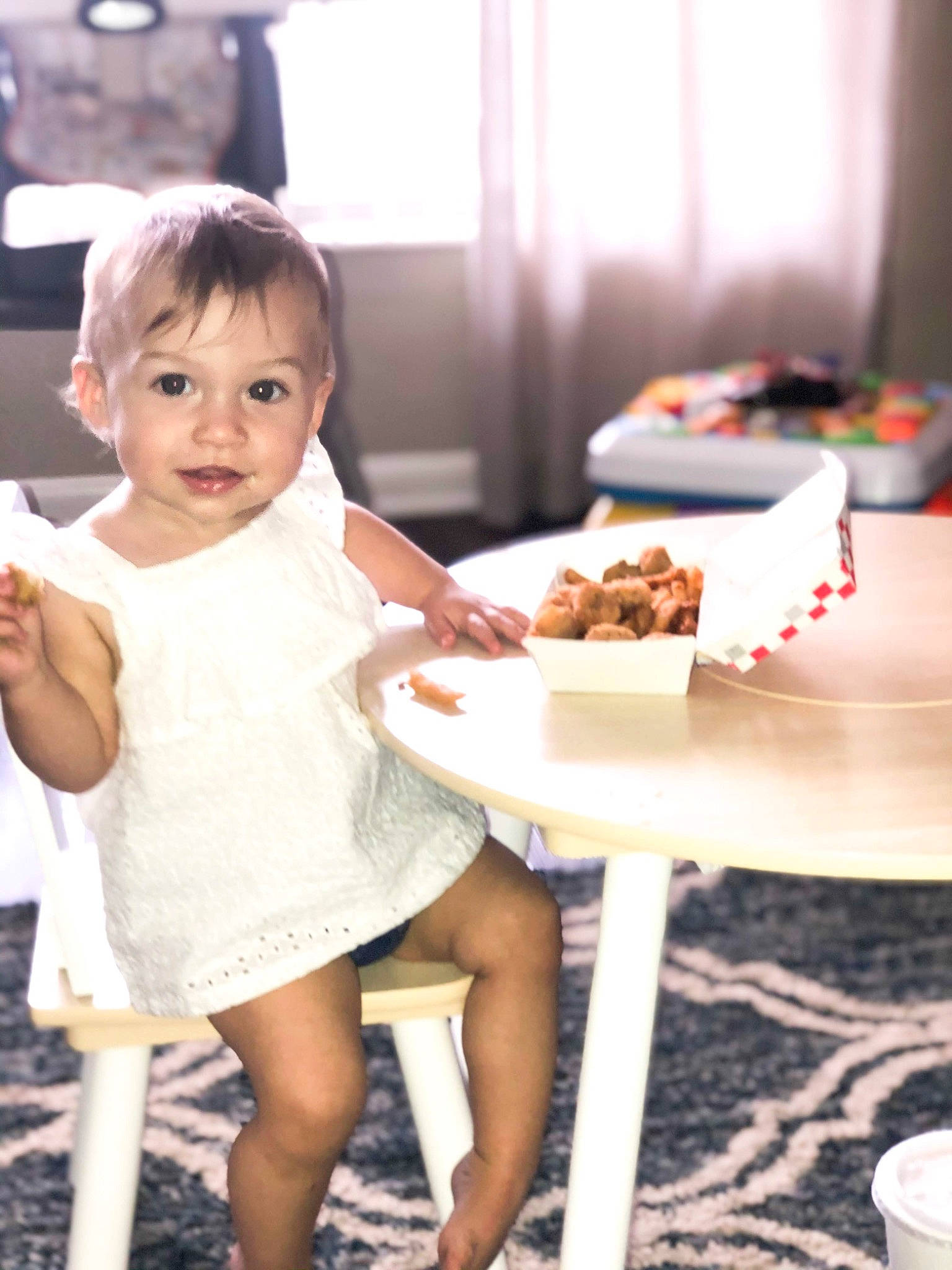 Harlee joined the competition — help win amazing prizes! baby, beauty, breakfast, child, finger_food, food, leg, meal, person, play, sitting, smile, table, toddler, vacation