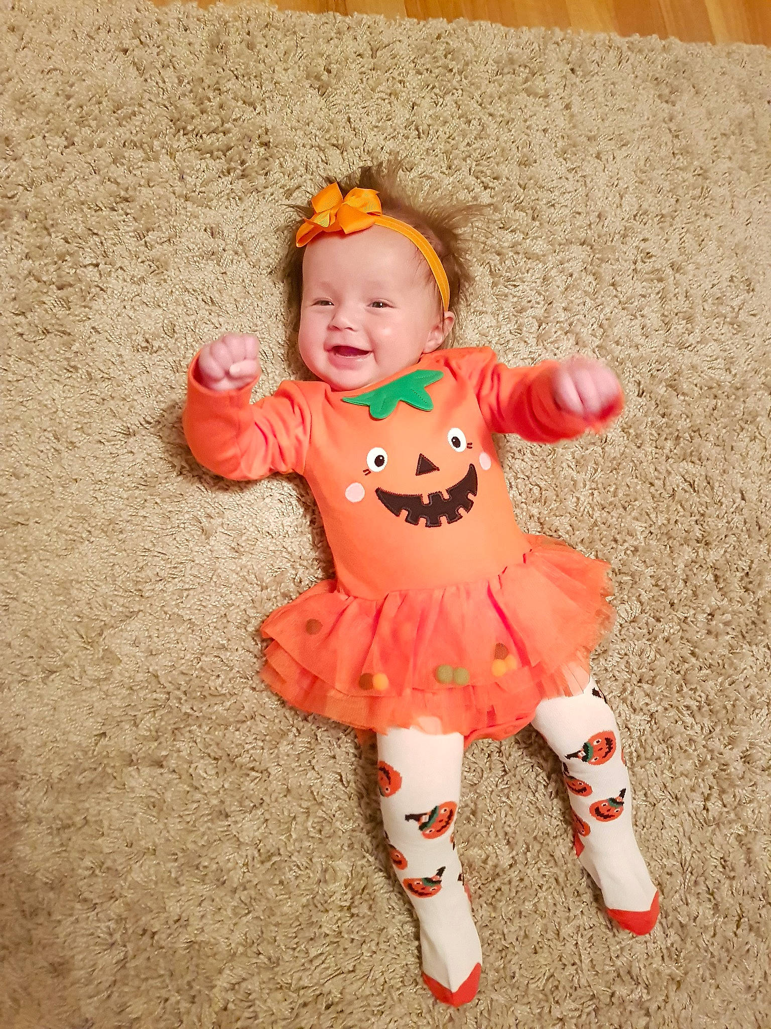 Aria is registered to the contest to win money with this photo: child, costume, infant, orange, person, play, product, toddler, toy