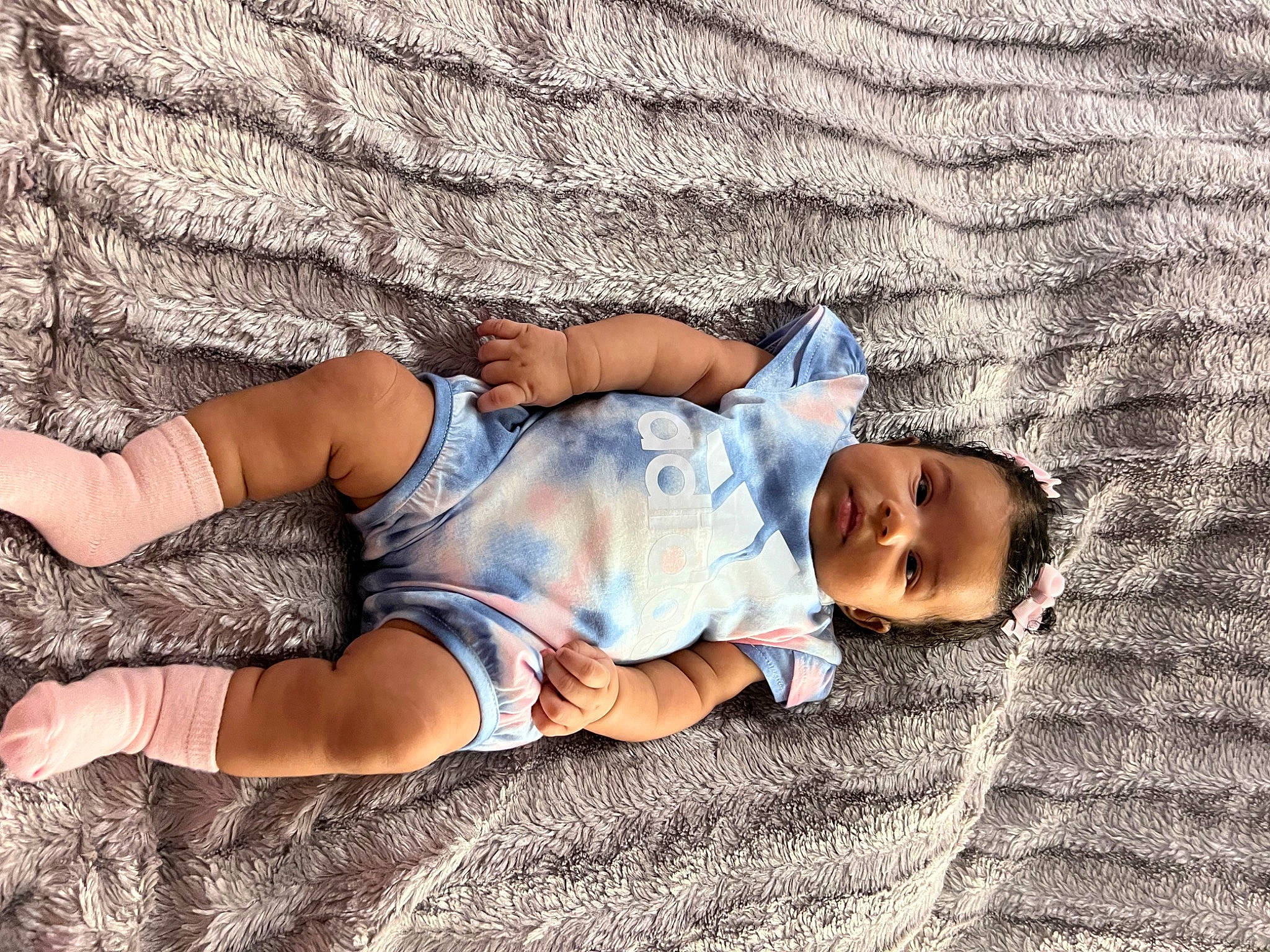 Mikayla joined the competition — help win amazing prizes! arm, azure, baby_toddler_clothing, comfort, eye, finger, grass, hand, headgear, human_body, knee, leg, mammal, muscle, people_in_nature, person, shorts, textile, thigh, vertebrate