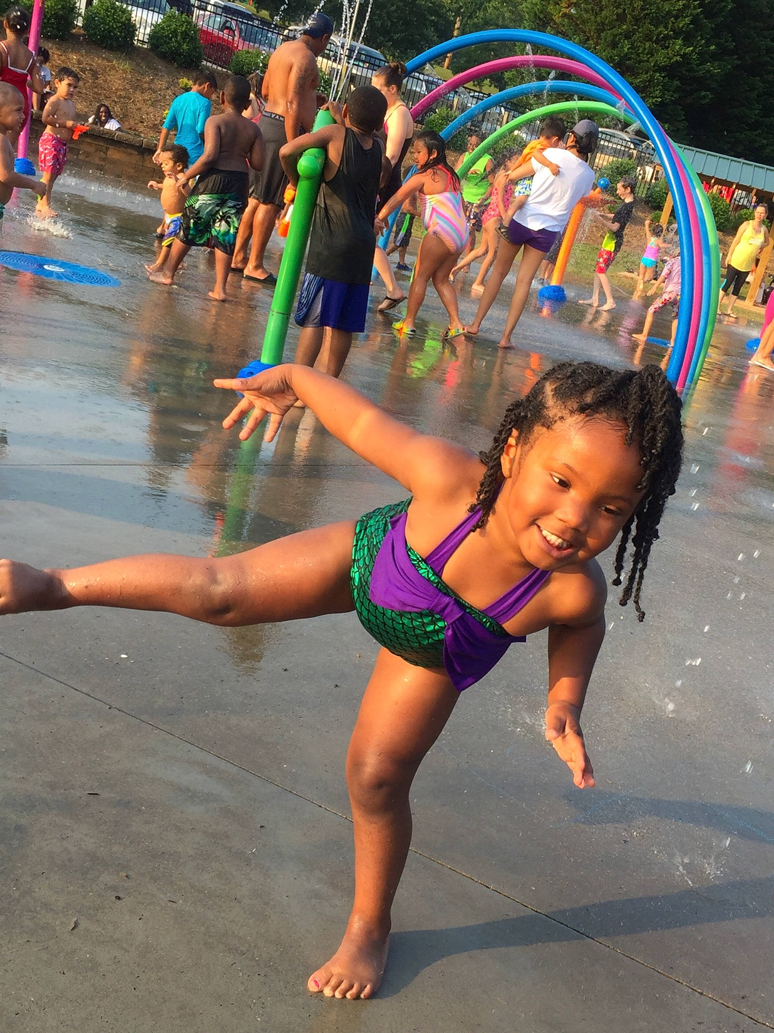 Iyanna joined the competition — help win amazing prizes! amusement_park, barefoot, child, dance, event, fun, joy, leisure, nonbuilding_structure, park, person, play, recreation, smile, street, summer, vacation, water_park