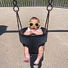 baby, bucket_swing, child, concrete, cool, cute, feet, fun, grass, infant, legs, metal_chain, outdoor, park, playground, shadow, summer, sunglasses, sunny, swing