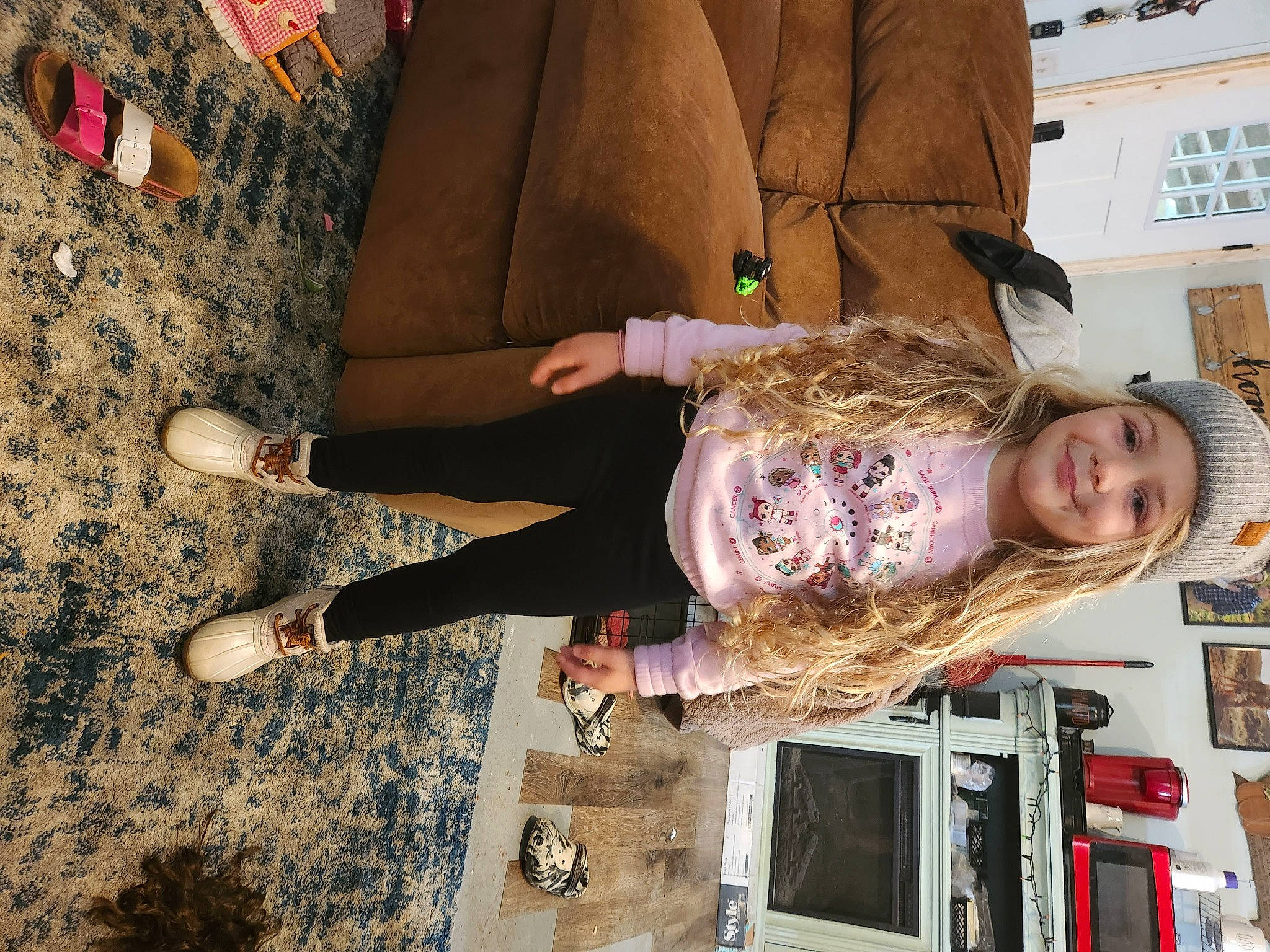 Brayah joined the competition — help win amazing prizes! child, clothing, flooring, fun, headwear, human_leg, joy, knee, pattern, person, room, smile, television, television_set, thigh, toddler, tree, walking_shoe, wood