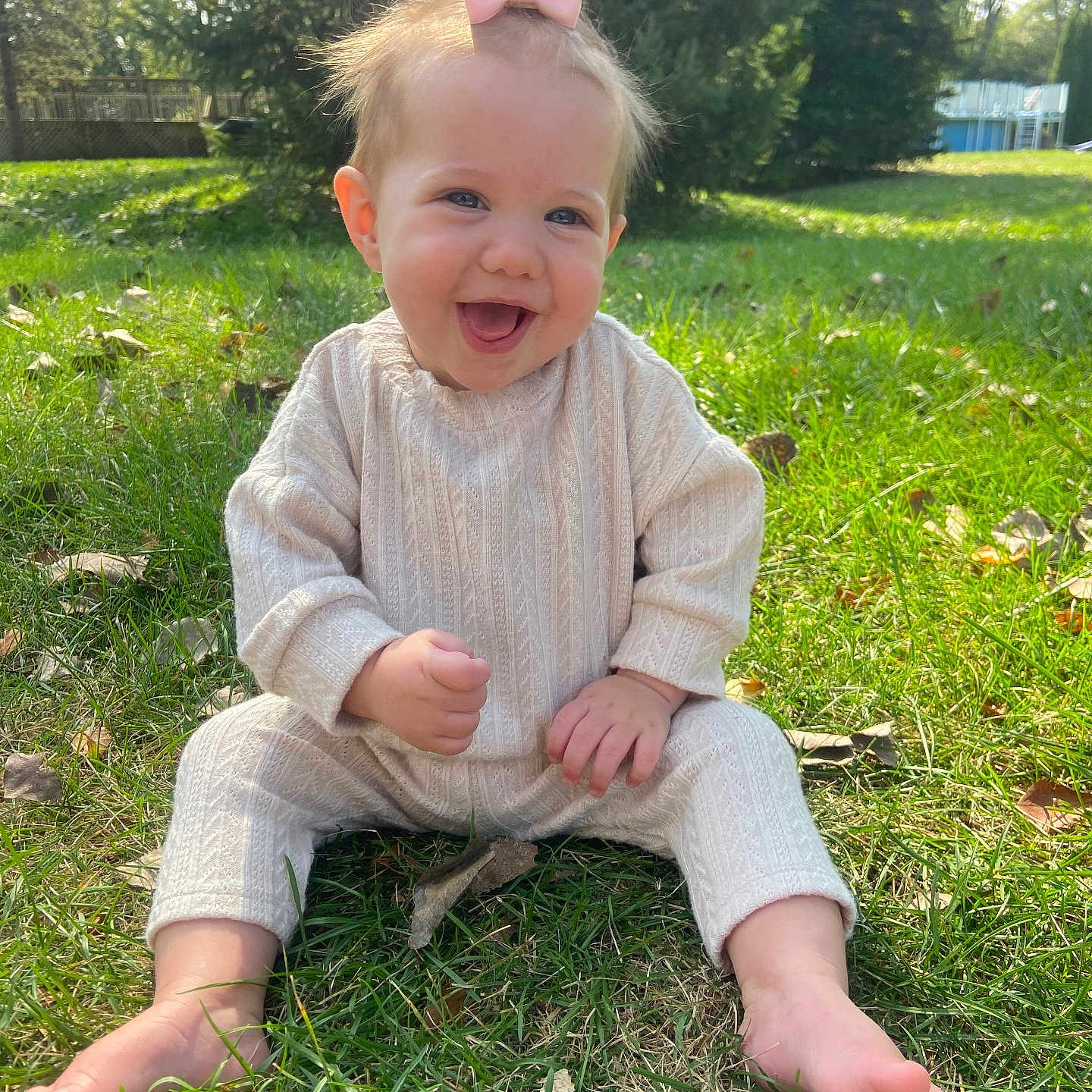 Iris joined the competition — help win amazing prizes! baby, backyard, clothing, dress, face, grass, happy, head, lawn, nature, outdoors, pants, park, person, photography, plant, portrait, sitting, tree, yard