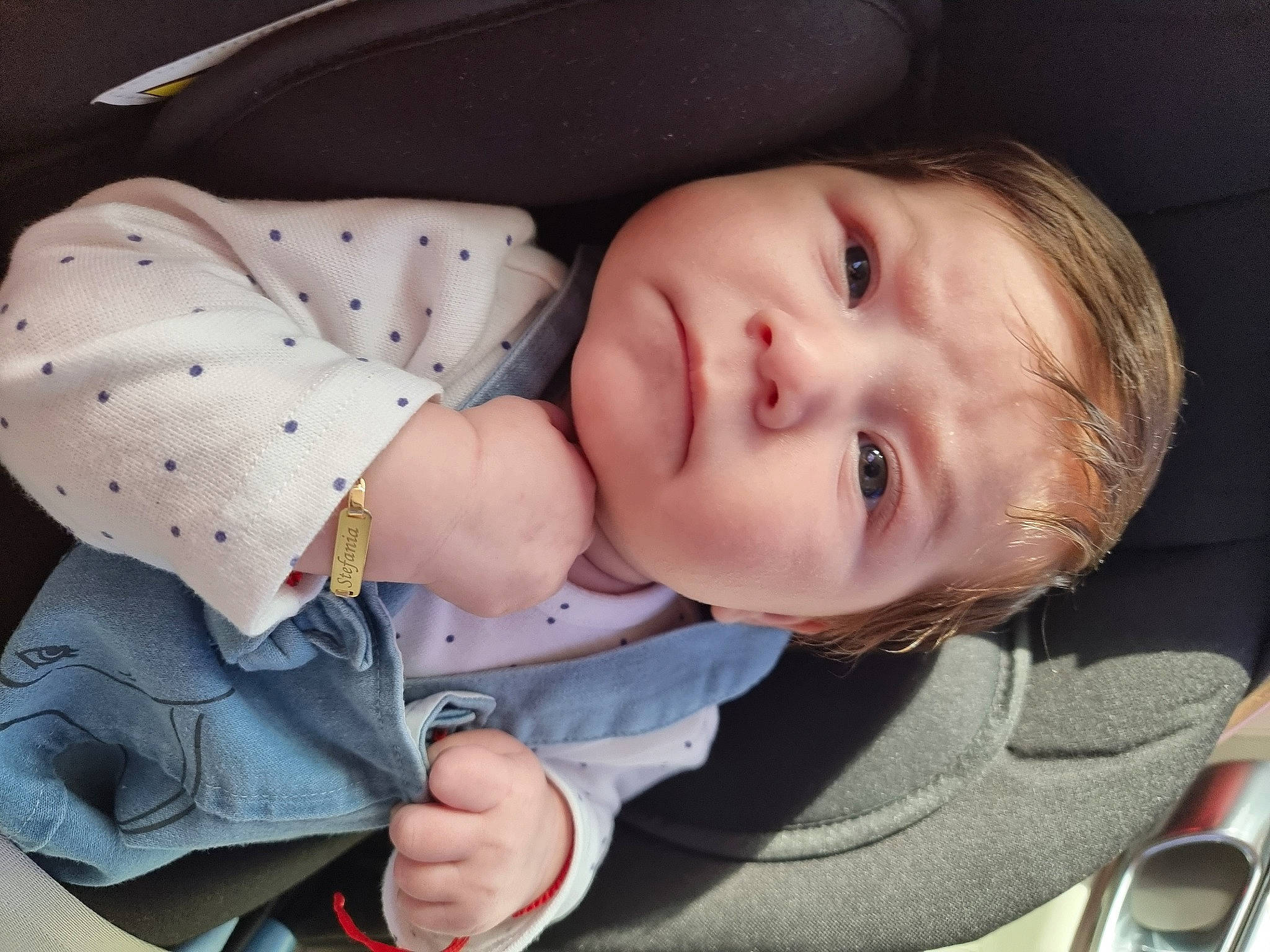 Alexia joined the competition — help win amazing prizes! baby, baby_products, baby_sleeping, baby_toddler_clothing, car_seat, cheek, child, comfort, eyelash, facial_expression, lip, mouth, nose, pattern, person, sitting, skin, sleeve, toddler