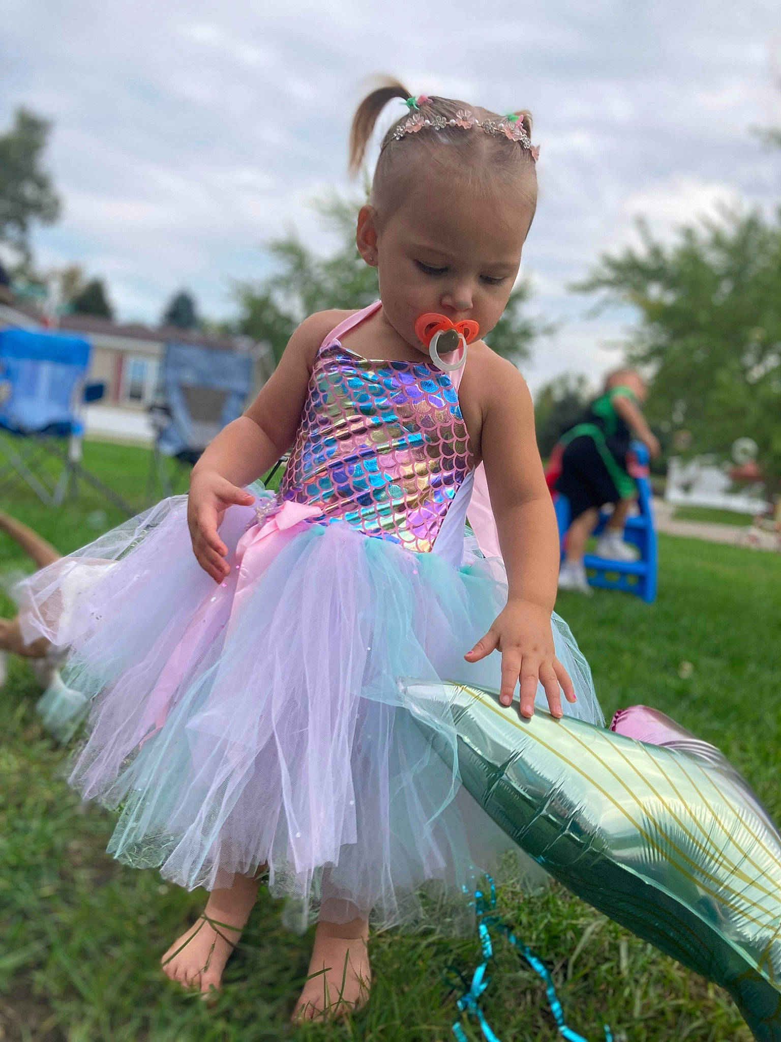 Persephone is registered to the contest to win money with this photo: baby_toddler_clothing, child, cloud, dress, event, fun, grass, grass_family, grassland, happy, lawn, leisure, meadow, people_in_nature, person, pink, plant, sky, toddler, tree