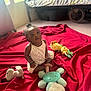 Mencia a rejoint le concours — aidez-le/la à gagner de superbes lots ! baby, bedroom, bracelet, carpet, child, clothing, curious, cute, face, floor, hair, indoor, person, plush_toy, red_blanket, sitting, soft_lighting, toddler, toy, window