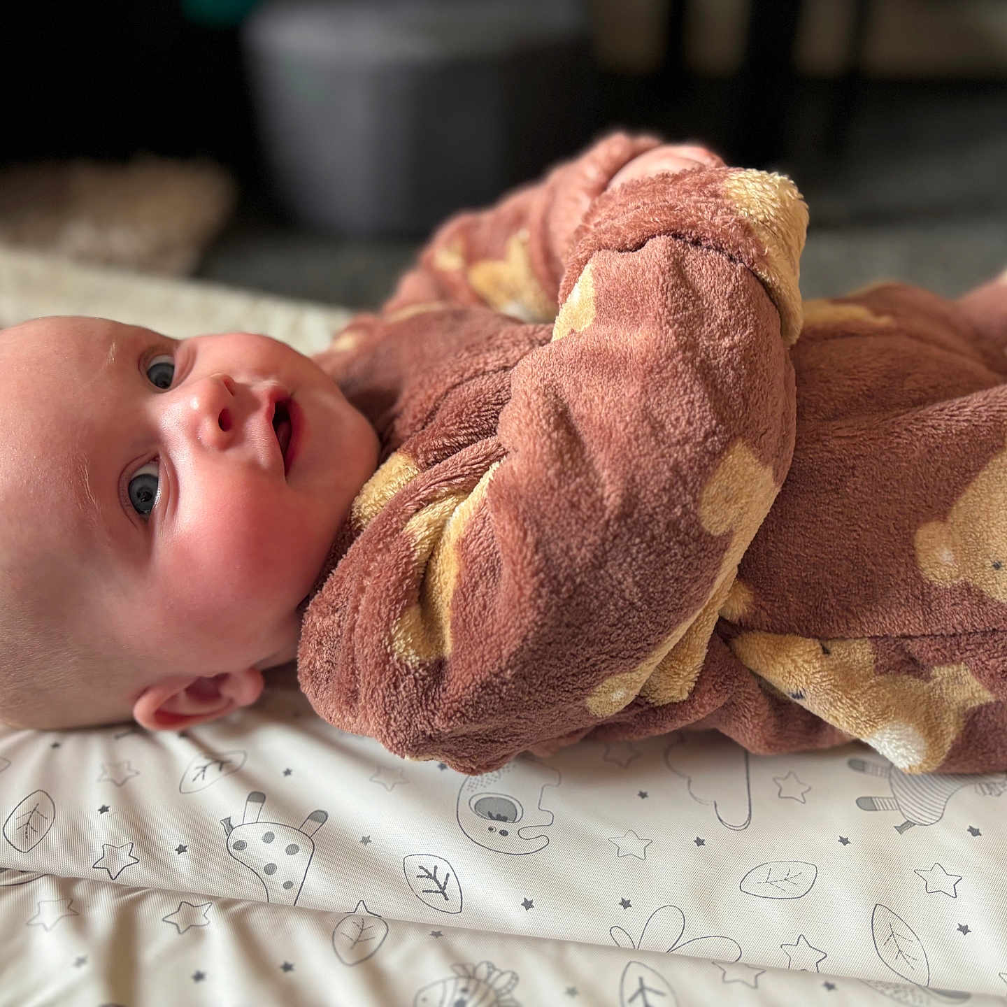 Mabel-Lilly joined the competition — help win amazing prizes! baby, baby_garment, blue_eyes, child, clothing, cozy, cute, face, head, indoors, infant, lying_down, onesie, patterned_mat, portrait, resting, smiling, soft_skin, teddy_bear_prints, young