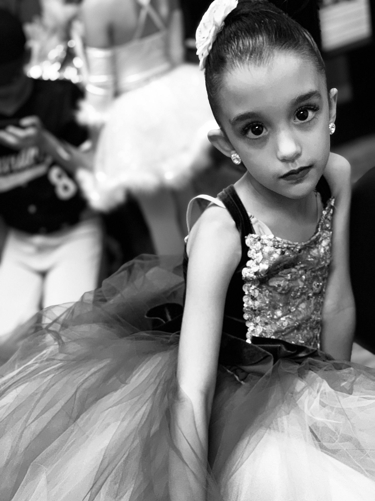 Angelina is registered to the contest to win money with this photo: ballet_tutu, black, black_and_white, ceremony, child, child_model, costume, dress, eye, flower_girl, happy, monochrome, monochrome_photography, person, photograph, photography, smile, style, toddler, wedding