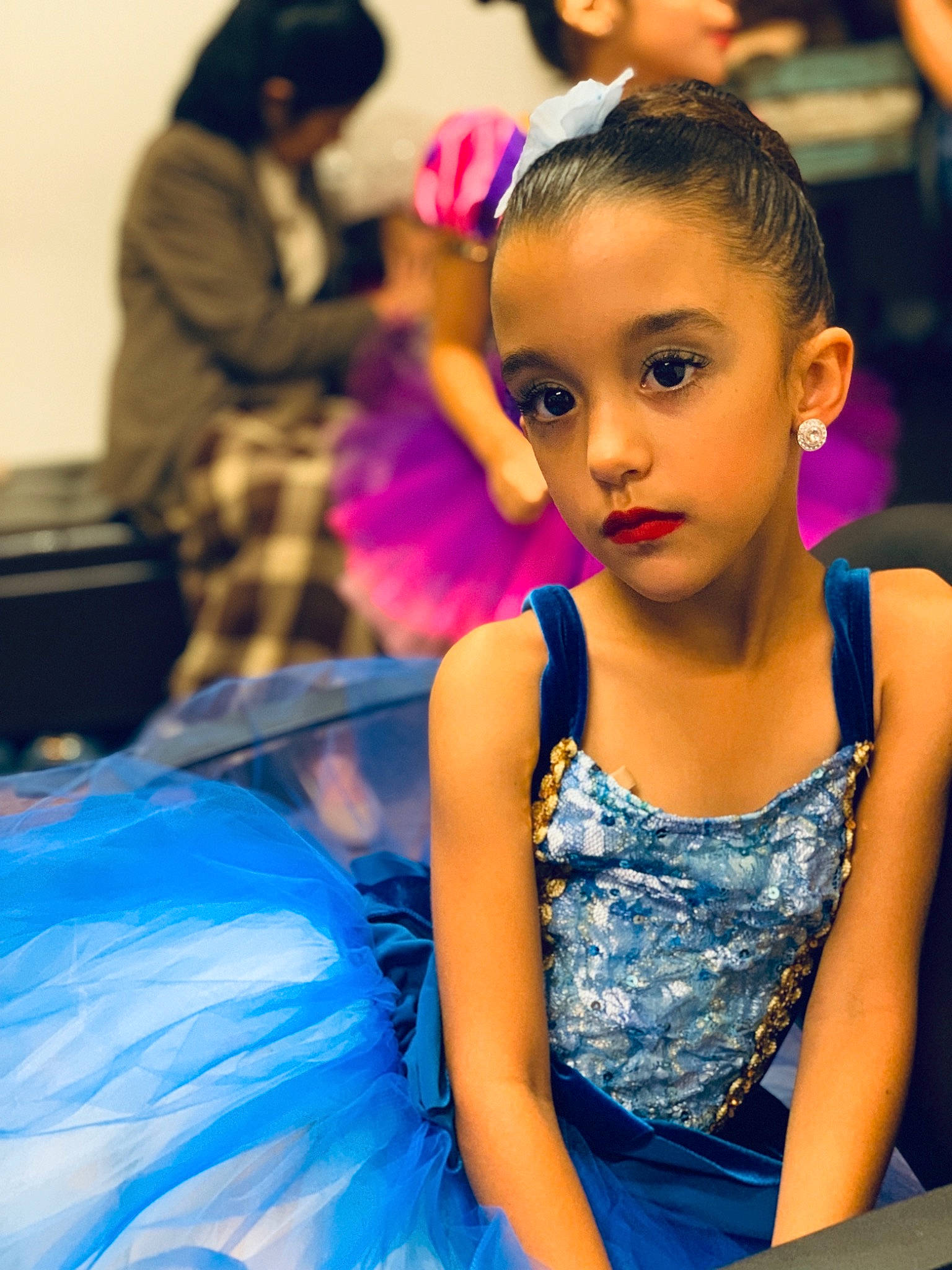 Angelina is registered to the contest to win money with this photo: blue, child, child_model, eye, fashion_design, fun, leisure, performance, person, pink, toddler