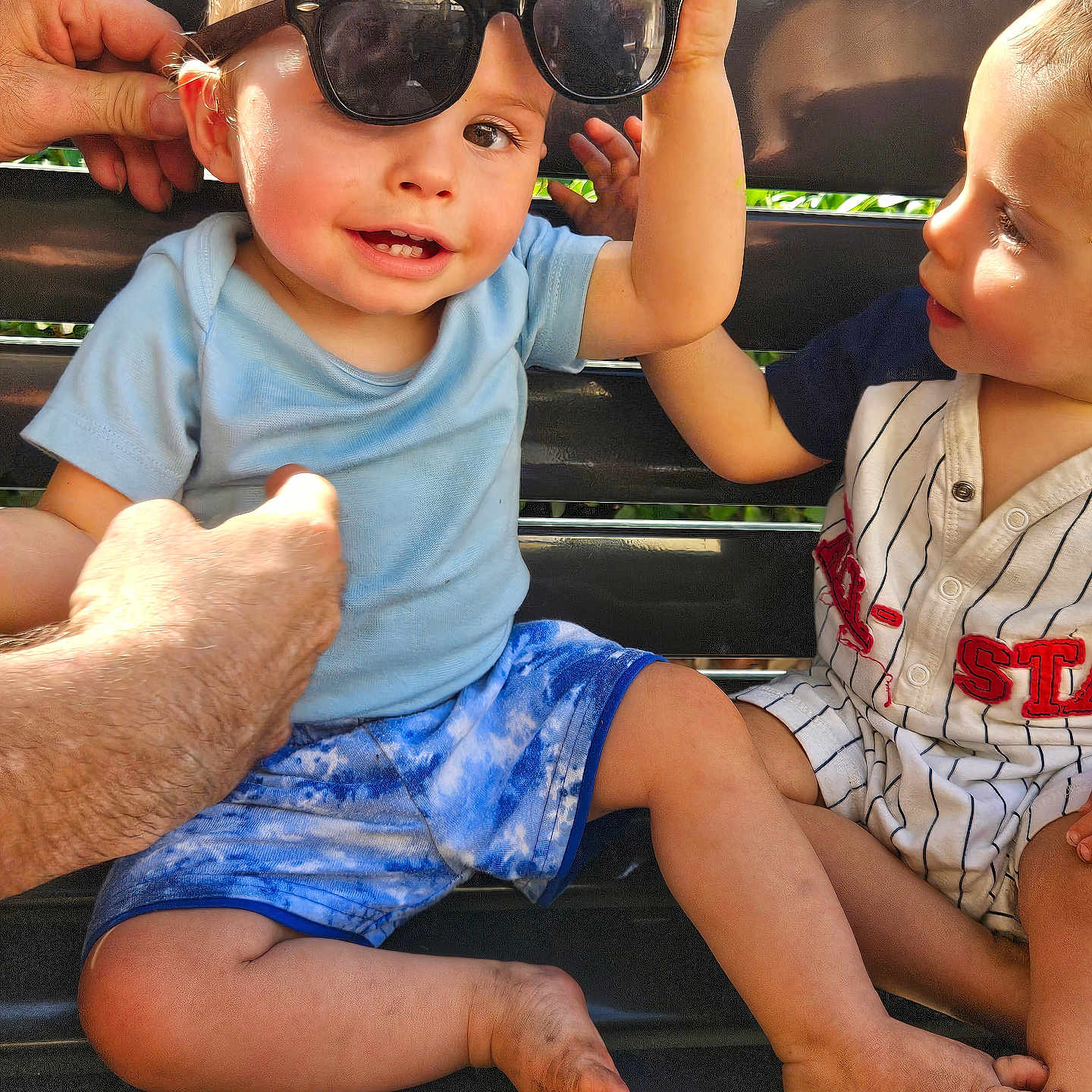 Vincent joined the competition — help win amazing prizes! accessories, baby, baseballcap, bodypart, cap, clothing, face, finger, glasses, hand, hat, head, person, photography, portrait, shorts, sitting, summer, sunglasses, t_shirt