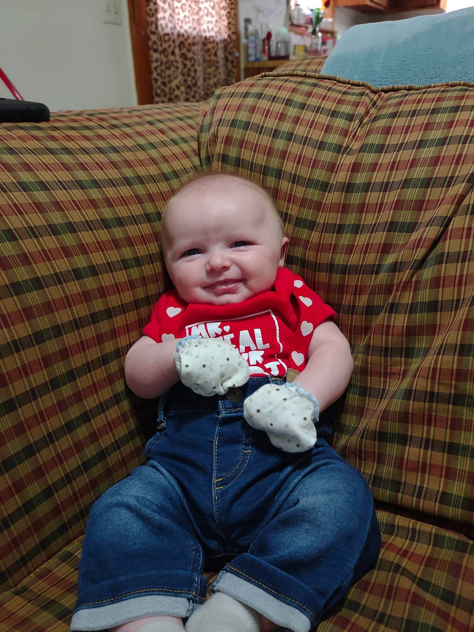 Collin joined the competition — help win amazing prizes! baby, baby_toddler_clothing, cheek, child, comfort, couch, flooring, happy, iris, joy, lap, living_room, pattern, person, plaid, sitting, skin, sleeve, smile, t_shirt