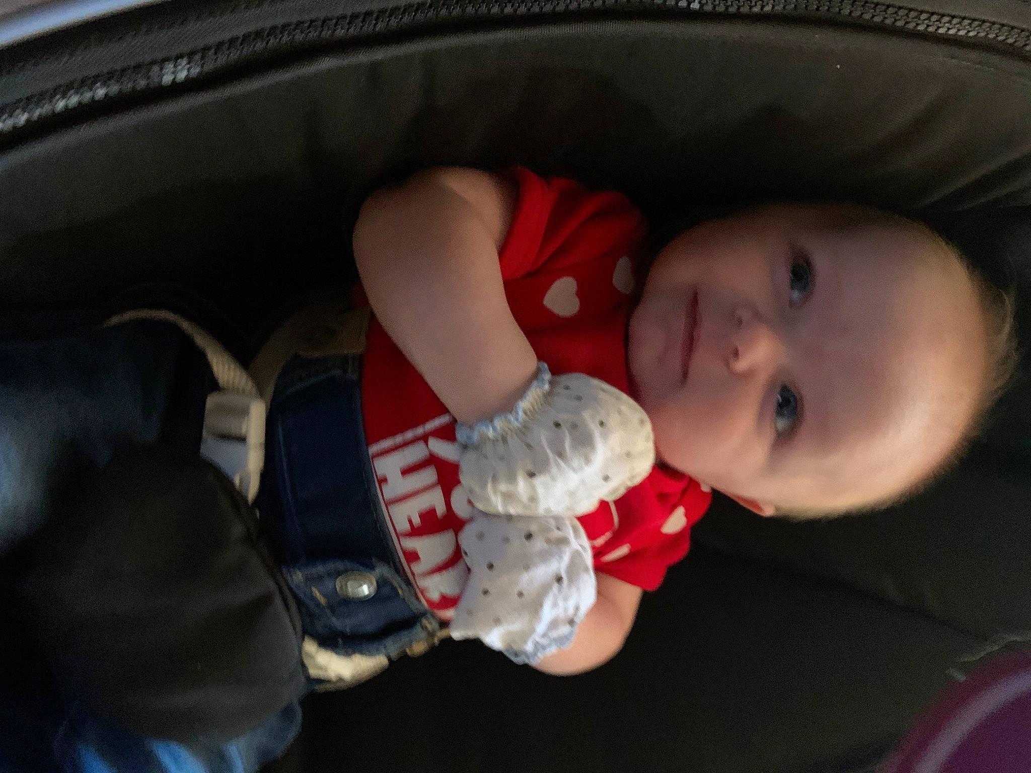 Collin is registered to the contest to win money with this photo: automotive_lighting, baby, baby_carriage, baby_products, baby_toddler_clothing, carmine, cheek, child, comfort, iris, lip, mouth, nose, person, skin, smile, steering_wheel, toddler, trunk, vehicle_door