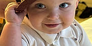 Raymond joined the competition — help win amazing prizes! apparel, baby, blue_eyes, child, closeup, cute, expression, face, fashion, hand, happy, hat, headwear, indoor, person, portrait, smile, toddler, white_shirt, young_child