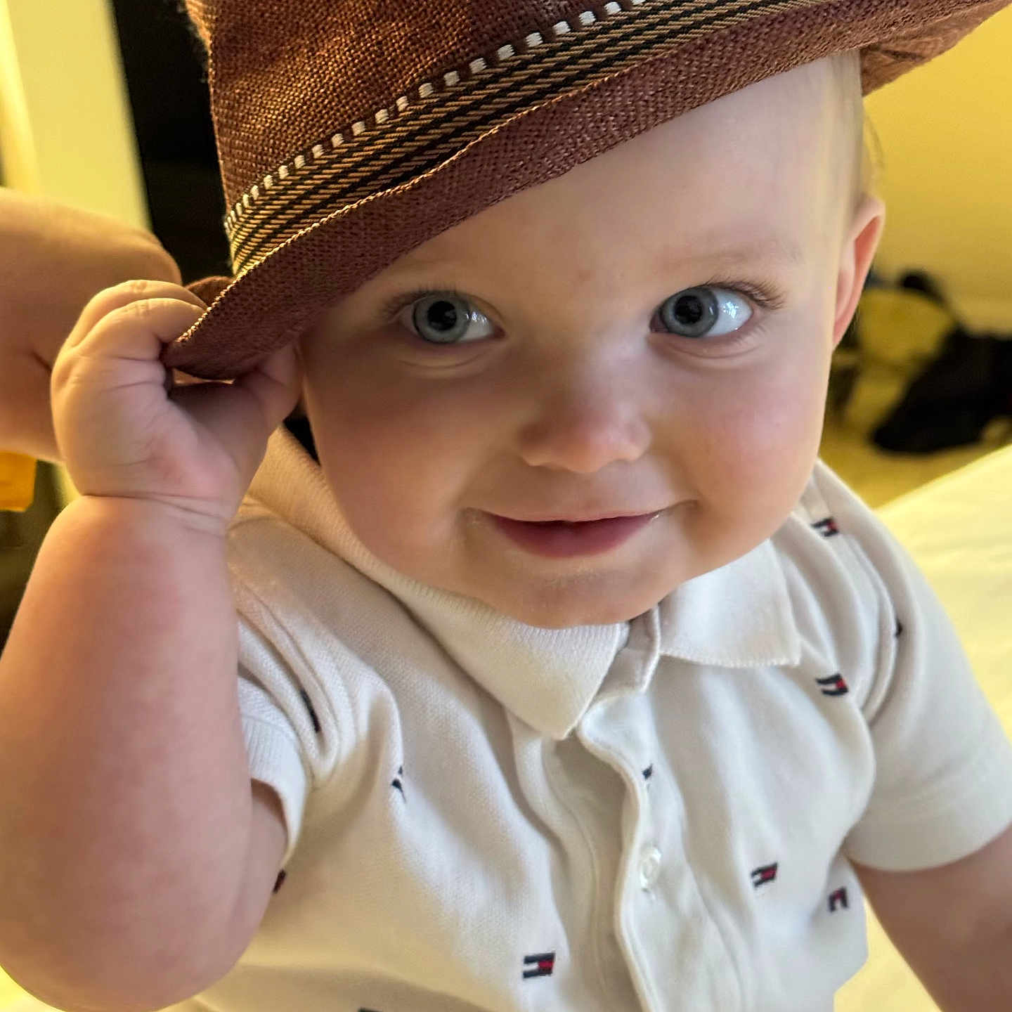 Raymond joined the competition — help win amazing prizes! apparel, baby, blue_eyes, child, closeup, cute, expression, face, fashion, hand, happy, hat, headwear, indoor, person, portrait, smile, toddler, white_shirt, young_child