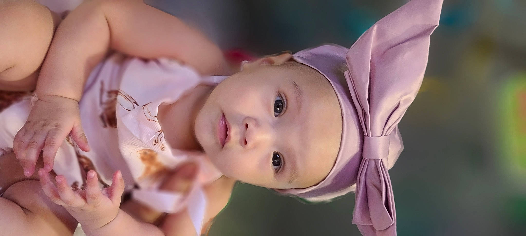 Zoe Anne is registered to the contest to win money with this photo: baby, cheek, child, ear, eyebrow, eyelash, flash_photography, fun, grass, happy, hat, headpiece, headwear, human_body, iris, lip, mouth, nose, person, skin