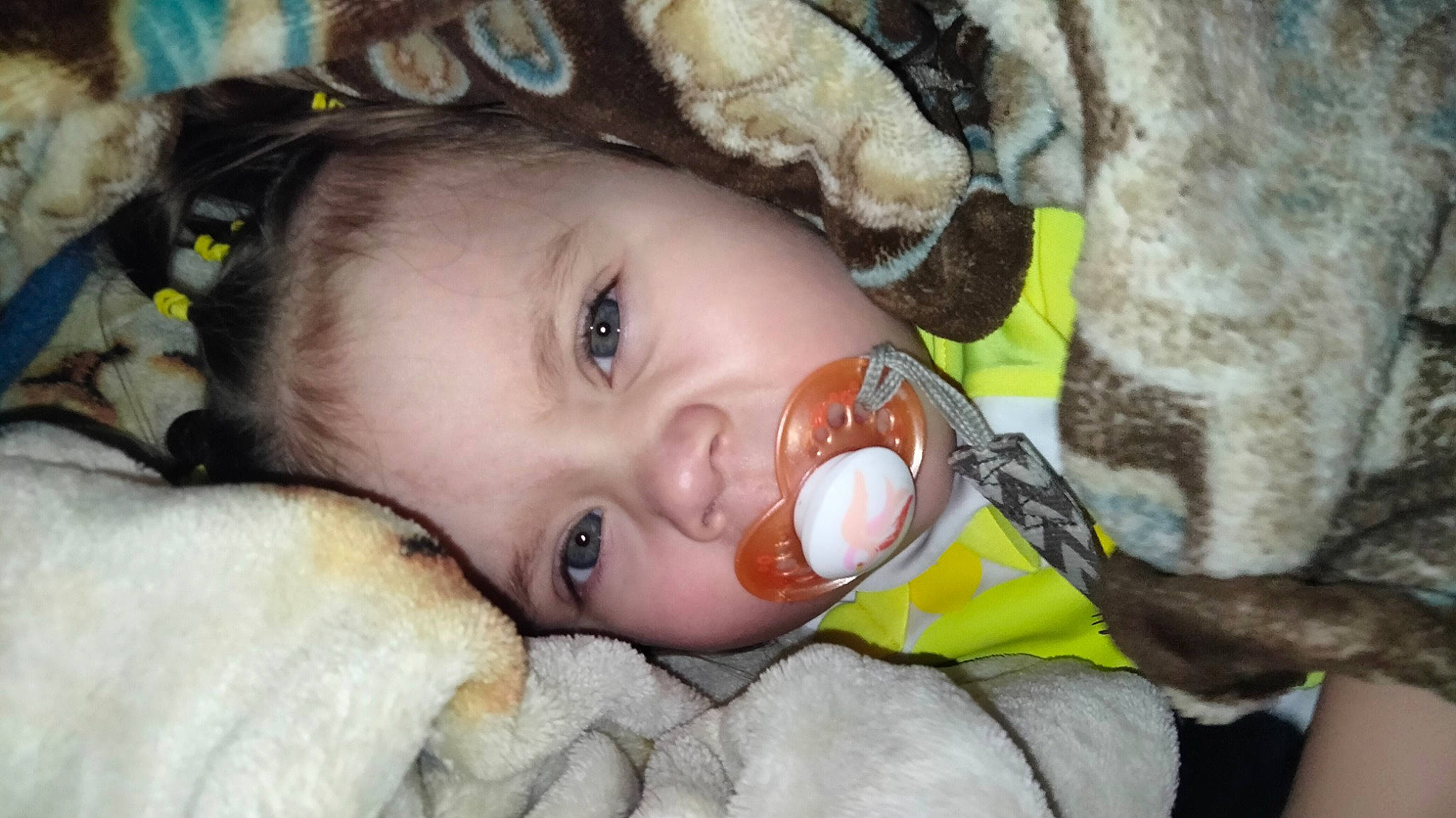 Athena is registered to the contest to win money with this photo: baby, cheek, chin, ear, eye, eyebrow, eyelash, facial_expression, fawn, happy, head, headgear, iris, lip, mouth, nose, person, skin, toddler, toy