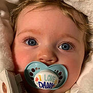 Lily joined the competition — help win amazing prizes! baby, blue_eyes, button, child, close_up, cozy, cute, expression, fabric, face, fluffy, infant, love_message, pacifier, portrait, soft, warm_clothing, white_jacket, winter, young