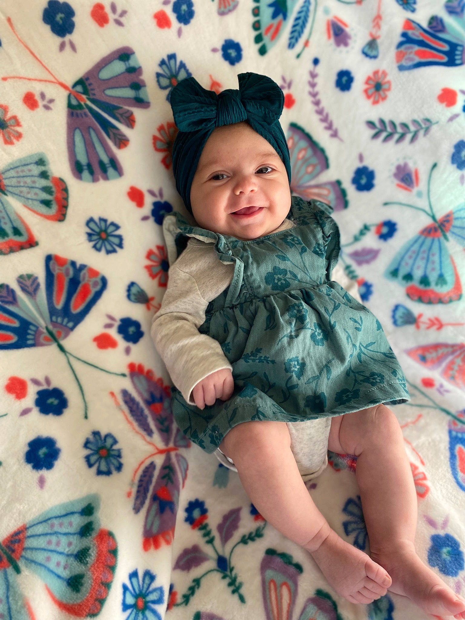 Lillian joined the competition — help win amazing prizes! baby_toddler_clothing, child, day_dress, dress, eye, face, facial_expression, fun, happy, head, headwear, human_leg, pattern, person, pink, skin, sleeve, smile, textile, thigh