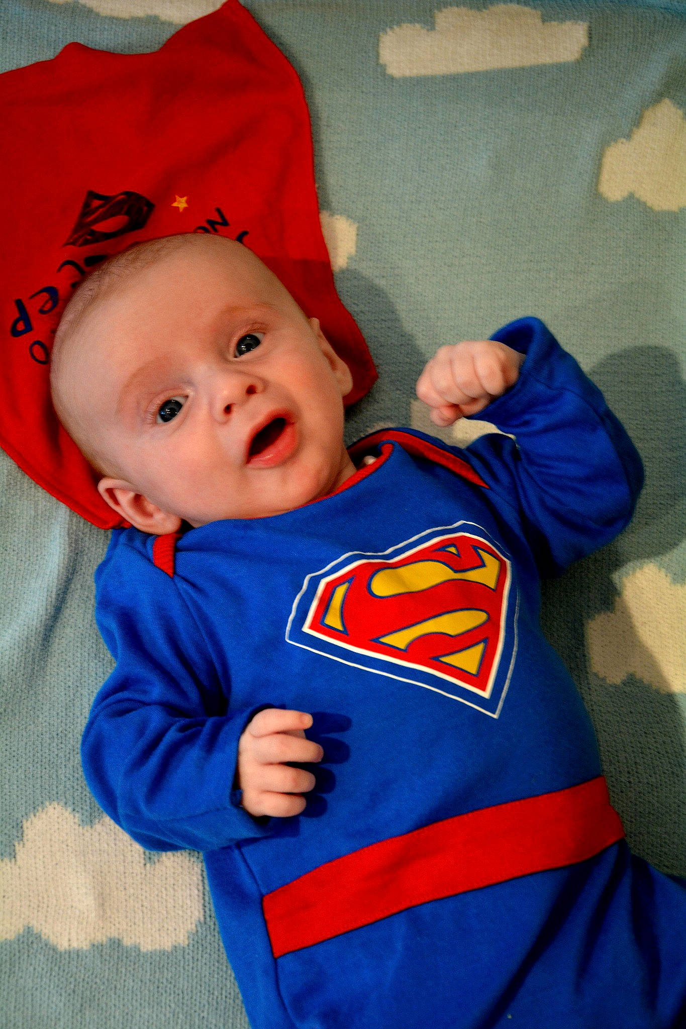 Maximilian joined the competition — help win amazing prizes! baby, blue, cheek, child, eye, fictional_character, head, justice_league, lip, mouth, nose, outerwear, person, product, red, skin, sleeve, smile, superhero, superman