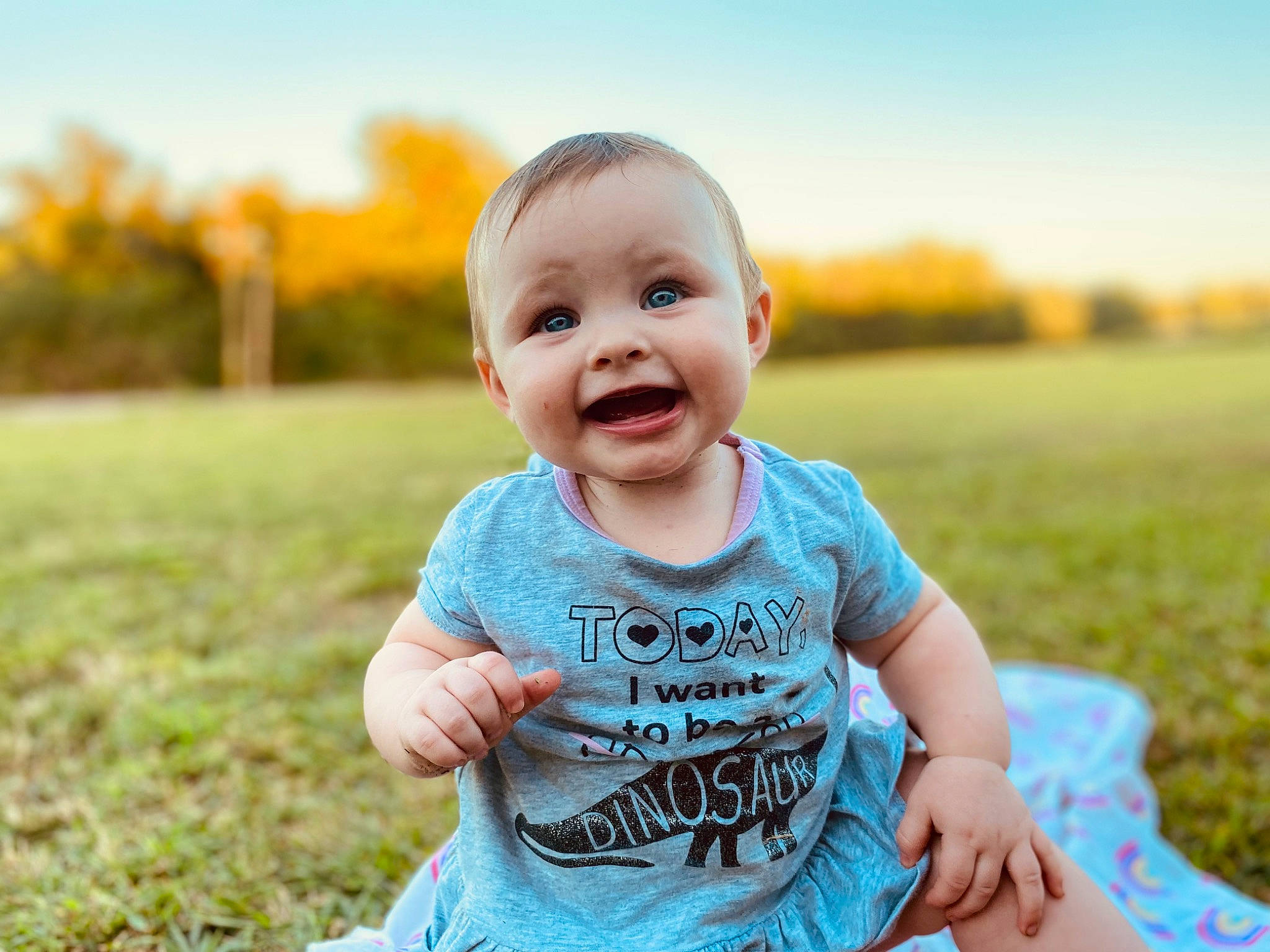 Alissa is registered to the contest to win money with this photo: baby, baby_toddler_clothing, child, flash_photography, fun, grass, grass_family, grassland, happy, joy, leisure, meadow, people_in_nature, person, plant, skin, sky, sleeve, smile, summer