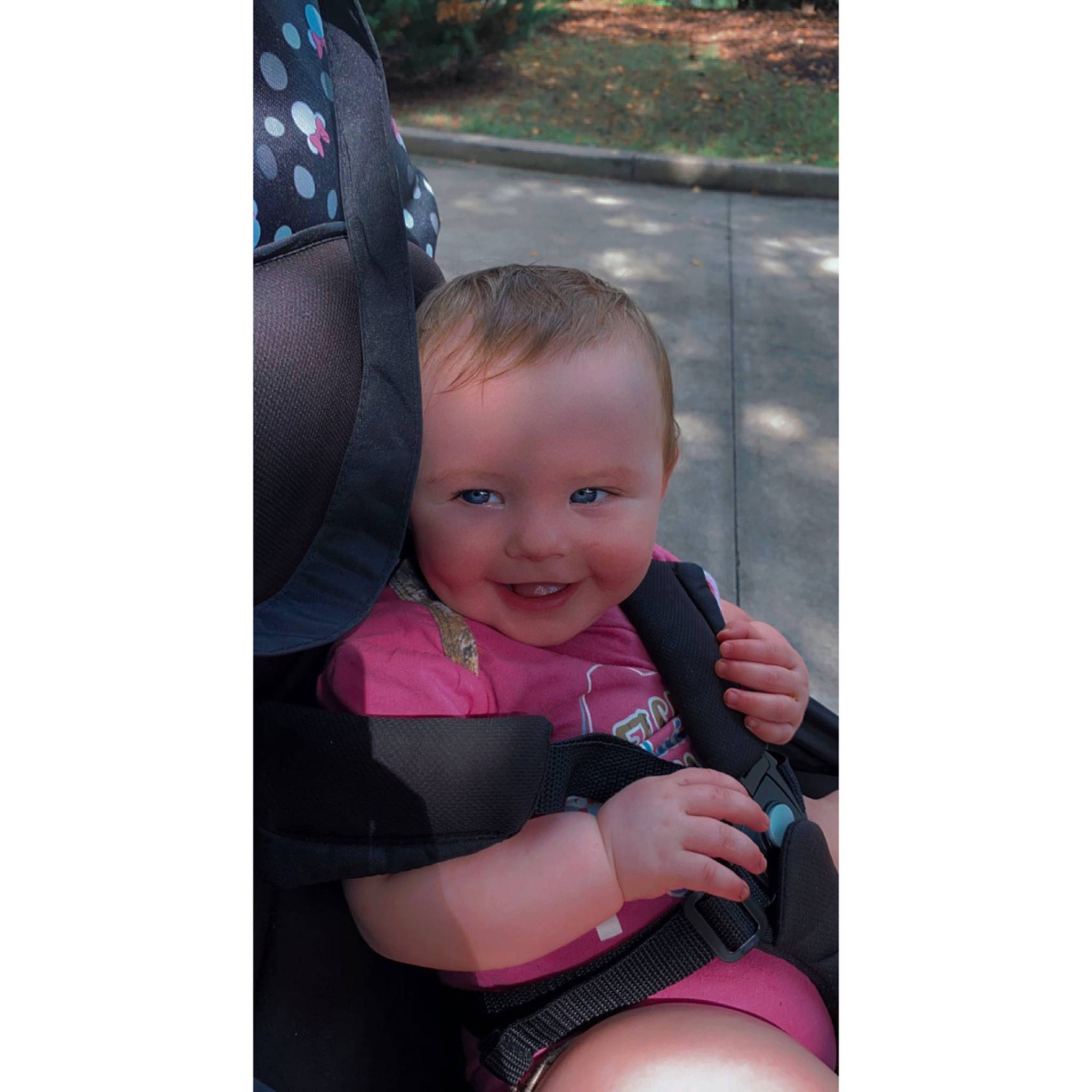 Alissa joined the competition — help win amazing prizes! baby, baby_products, baby_toddler_clothing, black_hair, chest, eye, happy, human_body, joy, magenta, outerwear, person, pink, plant, product, sitting, sleeve, smile, suit, thigh