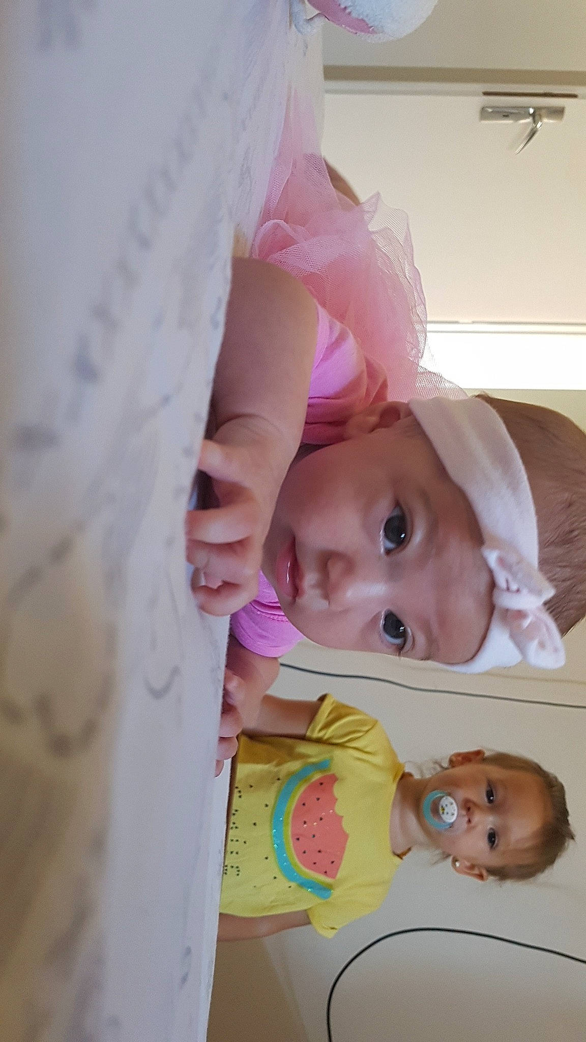 Kimberley a rejoint le concours — aidez-le/la à gagner de superbes lots ! baby, baby_products, baby_safety, baby_toddler_clothing, cheek, child, comfort, eye, eyelash, face, happy, headwear, iris, linens, pattern, person, pink, room, skin, textile