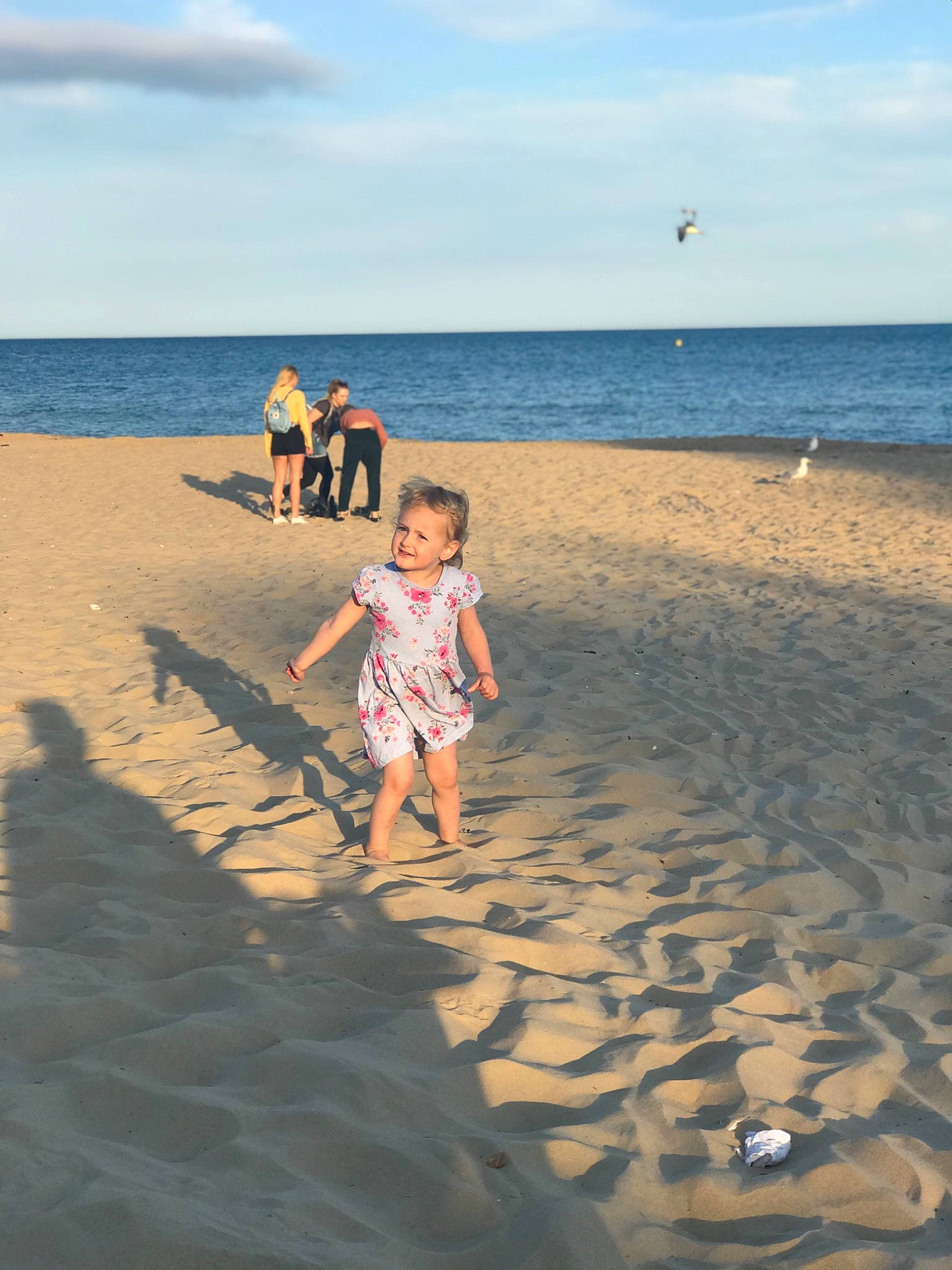 Nirvana is registered to the contest to win money with this photo: beach, child, cloud, coast, fun, horizon, joy, leisure, ocean, people_on_beach, person, photography, sand, sea, shore, sky, summer, sunlight, toddler, tourism