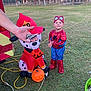 Ryder joined the competition — help win amazing prizes! adult, boy, child, costume, dalmatian, decoration, dog, festive, firefighter_hat, grass, halloween, hand, holiday, inflatable, outdoor, playful, pumpkin, smiling, spiderman, toy