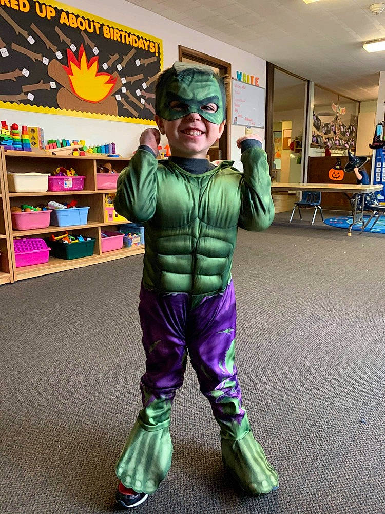 William is registered to the contest to win money with this photo: child, cosplay, costume, fiction, fictional_character, fun, headwear, person, superhero, vacation