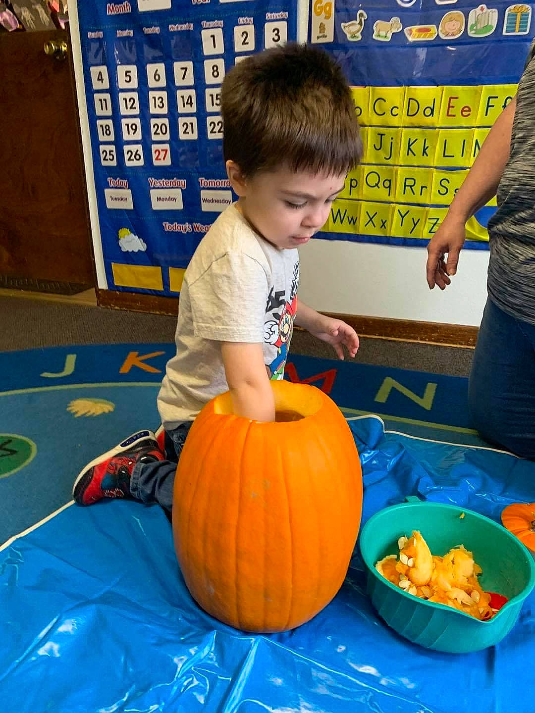 William is registered to the contest to win money with this photo: _and_melon_family, _gourd, calabaza, carving, child, cucumber, cucurbita, food, fruit, fun, gourd, jack_o_lantern, local_food, orange, person, plant, produce, pumpkin, squash, toddler
