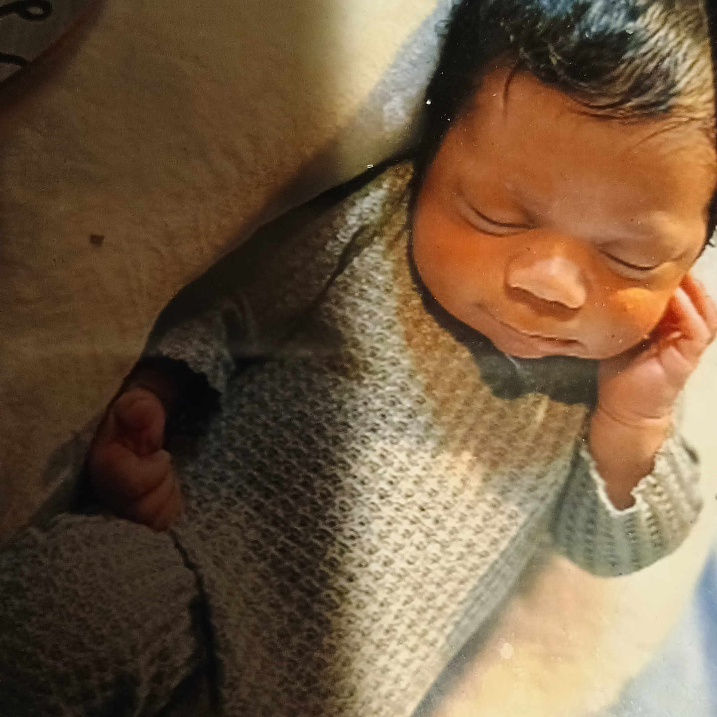 Jasiah joined the competition — help win amazing prizes! baby, blanket, child, comfort, cozy, cute, face, hand, indoors, infant, knitted_outfit, newborn, peaceful, portrait, relaxing, resting, sleeping, small, soft_light, warm