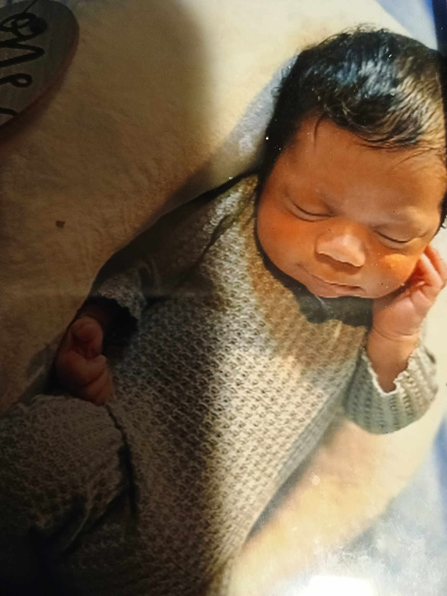 Jasiah joined the competition — help win amazing prizes! baby, sleeping, knitted_outfit, cozy, infant, hand, face, blanket, soft_light, newborn, peaceful, cute, portrait, resting, child, indoors, warm, comfort, small, relaxing
