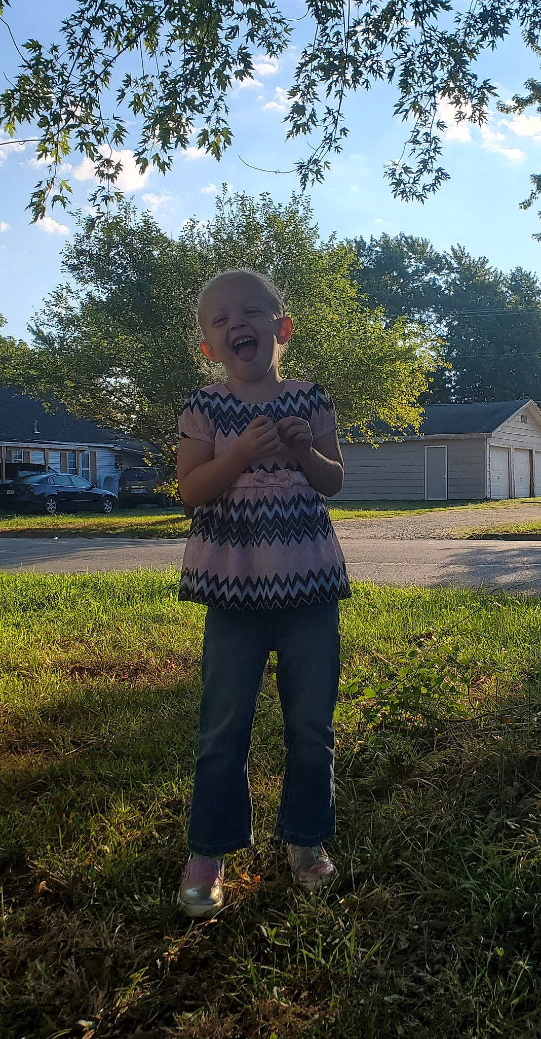 Alaeja is registered to the contest to win money with this photo: backlighting, denim, electric_blue, eyewear, fun, garden, grass, grass_family, grassland, happy, landscape, lawn, leisure, people_in_nature, person, plant, shadow, sky, tints_and_shades, tree