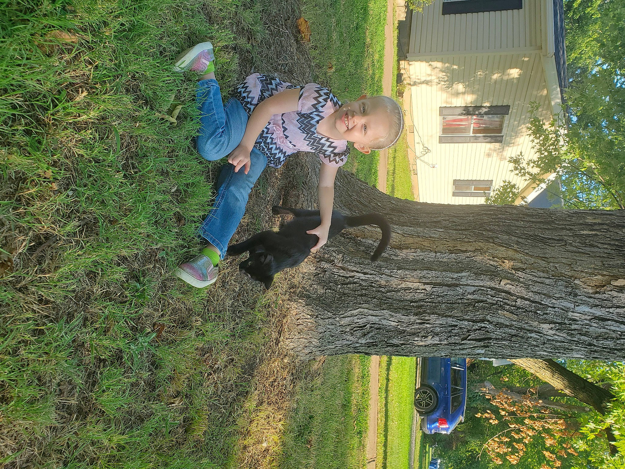 Alaeja joined the competition — help win amazing prizes! electric_blue, fun, garden, grass, joy, landscape, lawn, leaf, leisure, people_in_nature, person, plant, recreation, shadow, soil, toddler, tree, trunk, walking_shoe, window