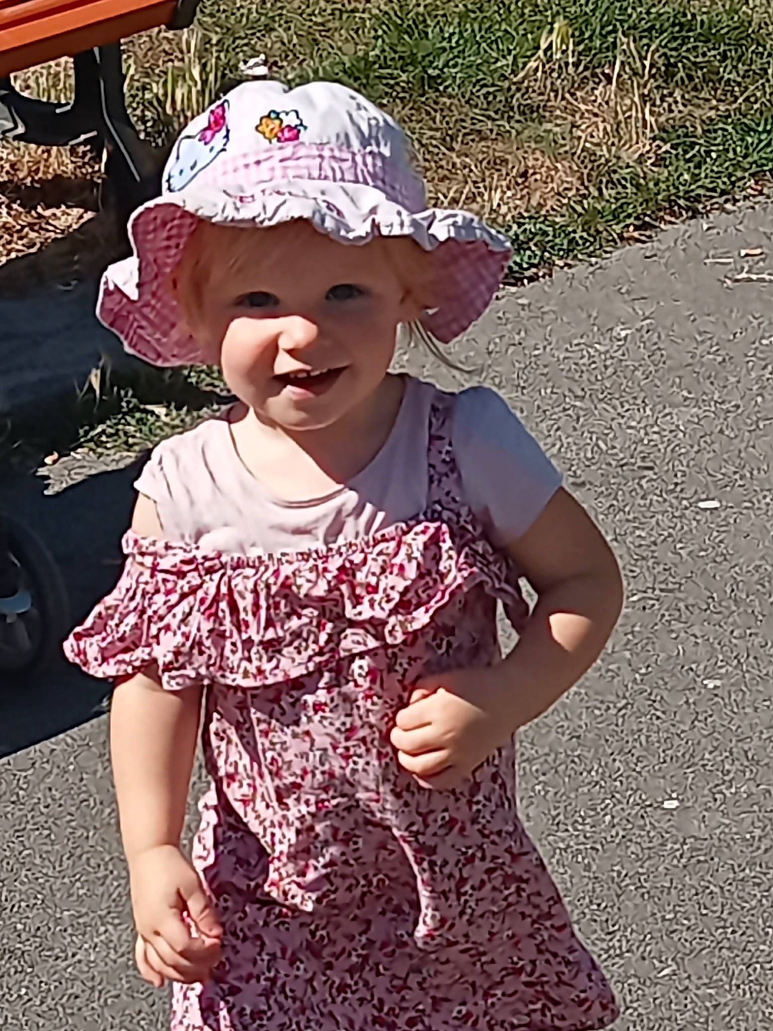 Alexia participe au concours pour gagner de l'argent avec cette photo : baby_toddler_clothing, baseball_cap, cap, clothing, cool, day_dress, dress, gesture, happy, hat, headgear, headwear, joy, one_piece_garment, people_in_nature, person, pink, skin, sleeve, smile