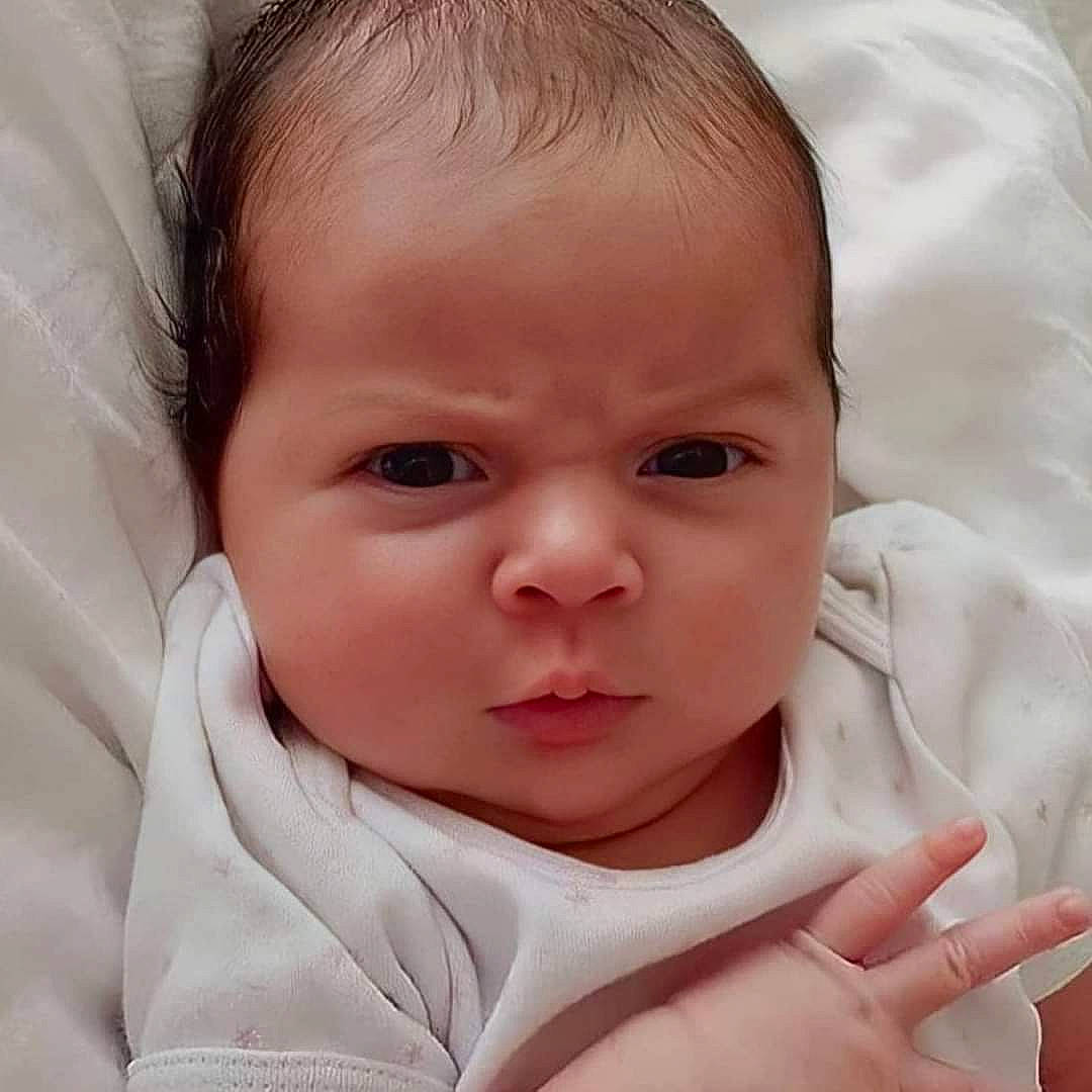 Ibrahim Khalil participe au concours pour gagner de l'argent avec cette photo : baby, baby_toddler_clothing, cheek, child, close_up, collar, comfort, eyebrow, eyelash, face, finger, gesture, iris, linens, lip, nose, person, skin, sleeve, thumb