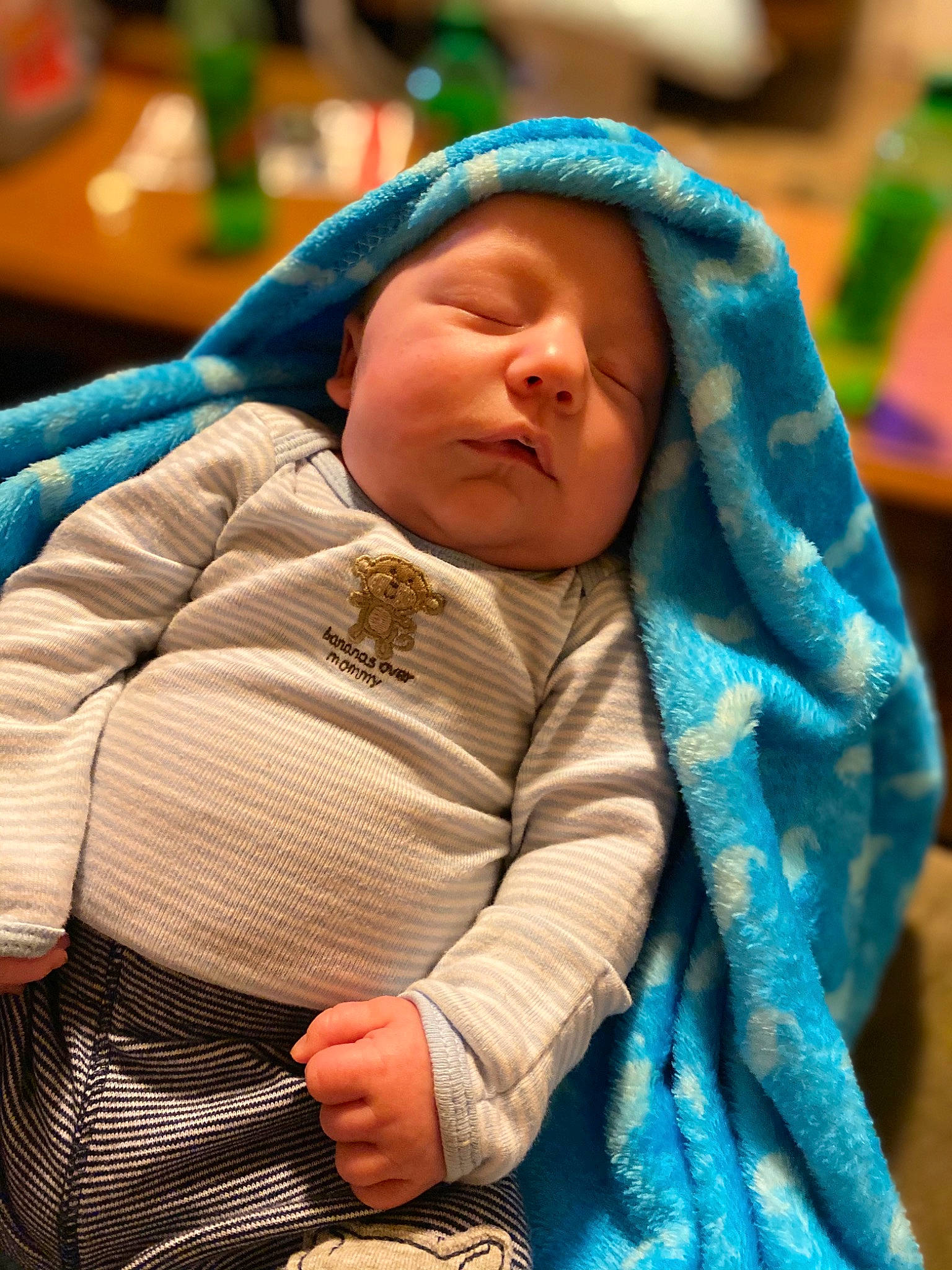 Walker is registered to the contest to win money with this photo: child, comfort, electric_blue, fun, fur, grass, green, happy, headwear, hood, hoodie, jacket, knit_cap, leisure, person, polar_fleece, sitting, sleep, toddler, winter