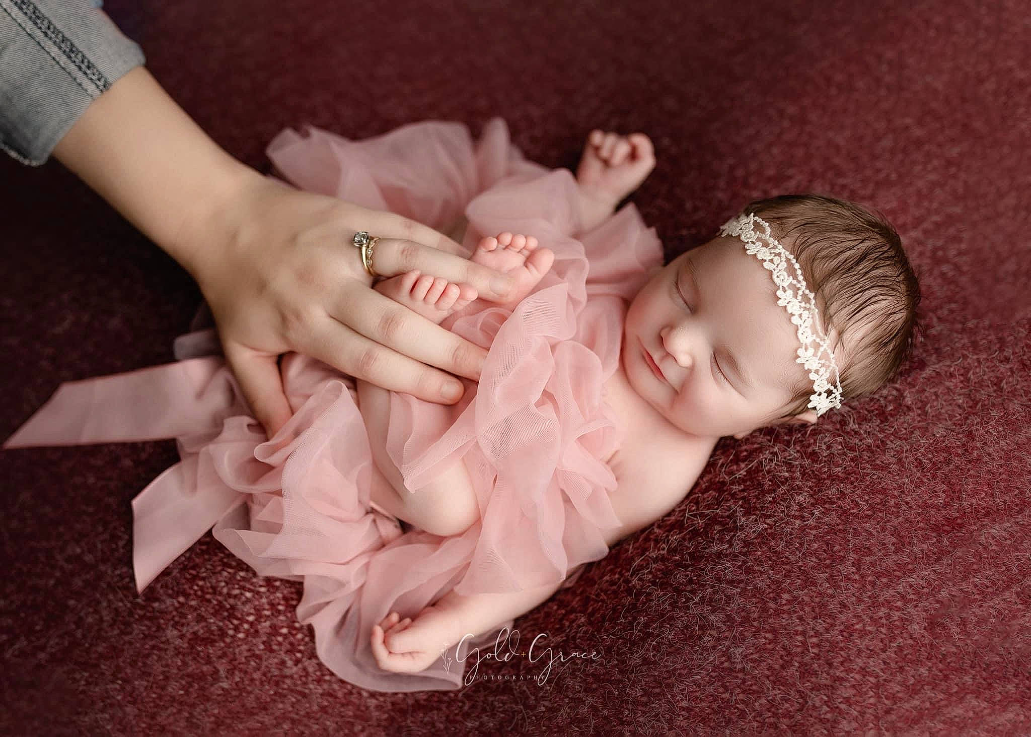 Scarlett is registered to the contest to win money with this photo: baby, baby_toddler_clothing, cheek, child, comfort, eye, face, finger, flash_photography, gesture, hand, head, headgear, headwear, mouth, nail, person, skin, thumb, toddler